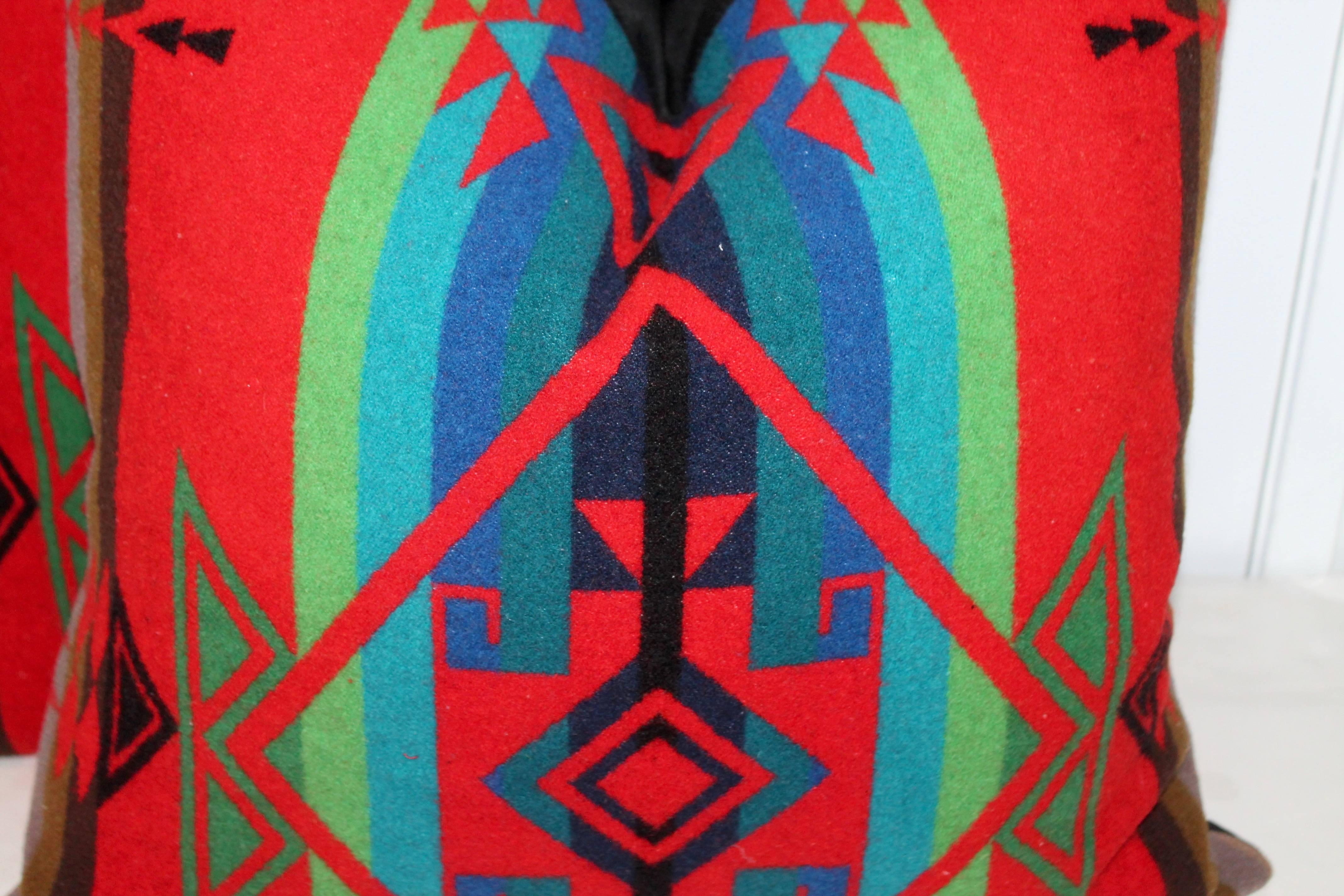 These amazing Pendleton Indian patterned camp blanket pillows are in pristine condition. The backing is in black cotton linen and down and feather fill. There are two pairs in stock.