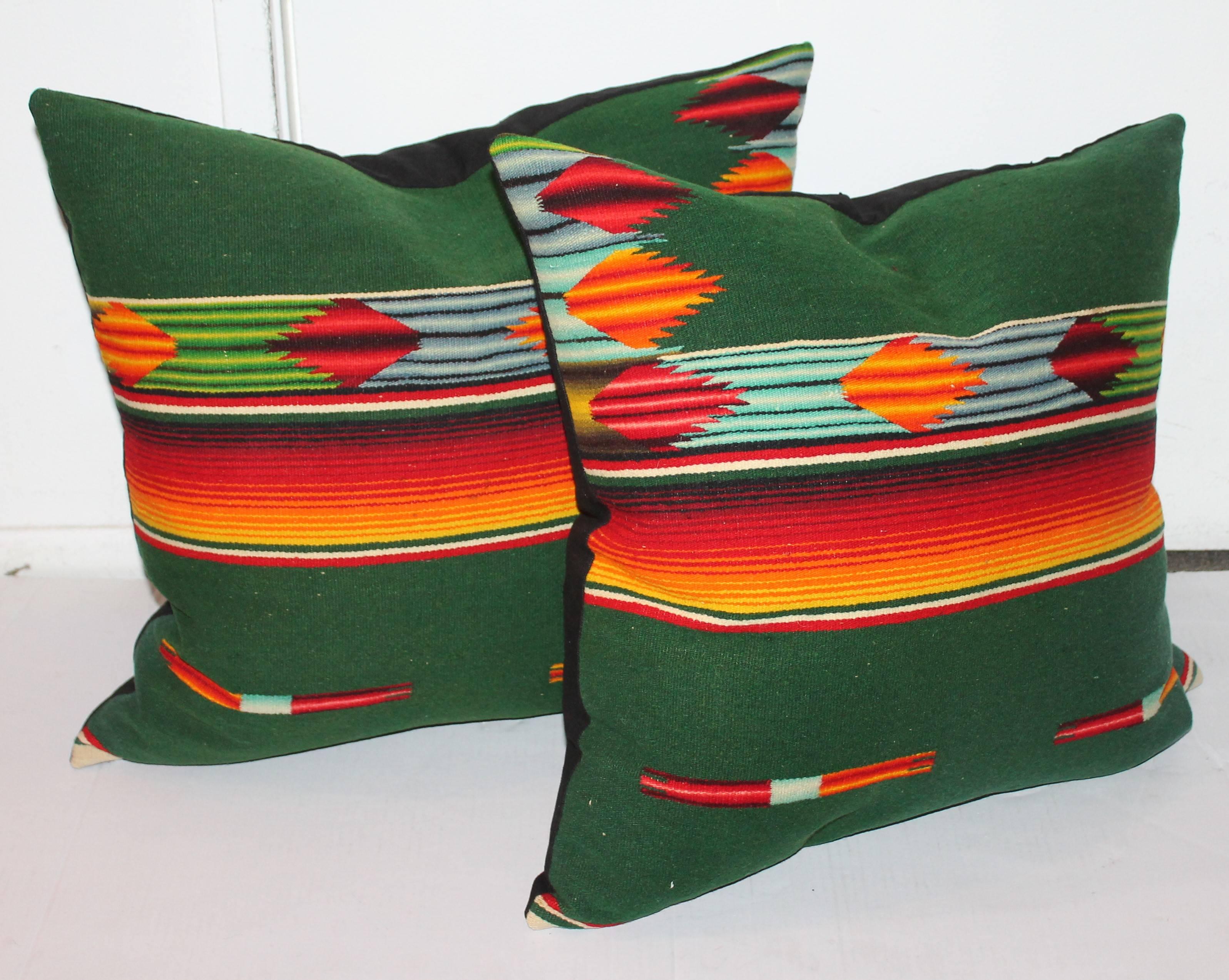 This pair of Mexican weaving's are in great as found condition. The backings are in black cotton linen. Sold as a pair.