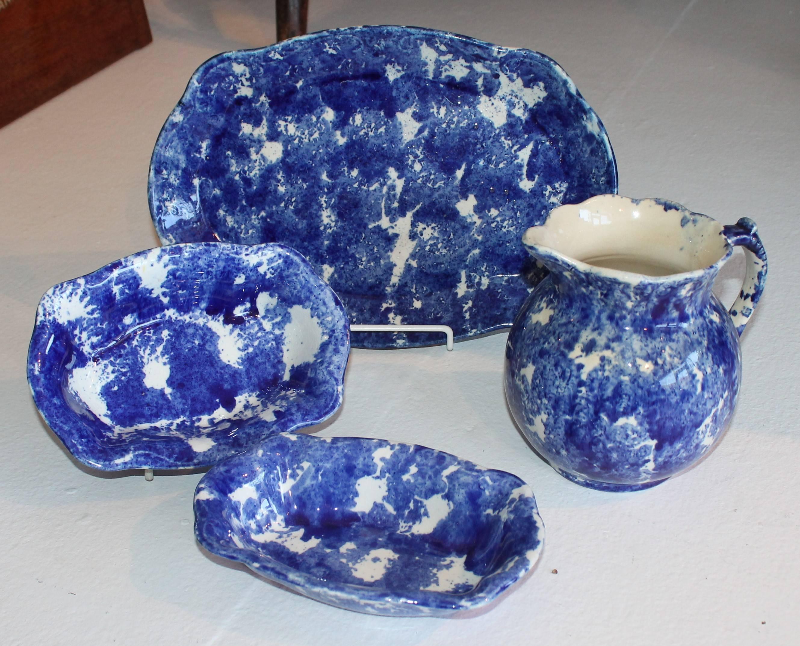 This beautiful 19th century set of sponge ware is in pristine condition. This set include one large platter, two vegetable bowls and one pitcher. Each item was inspected and show little to no signs of wear. This beautiful set of sponge ware is