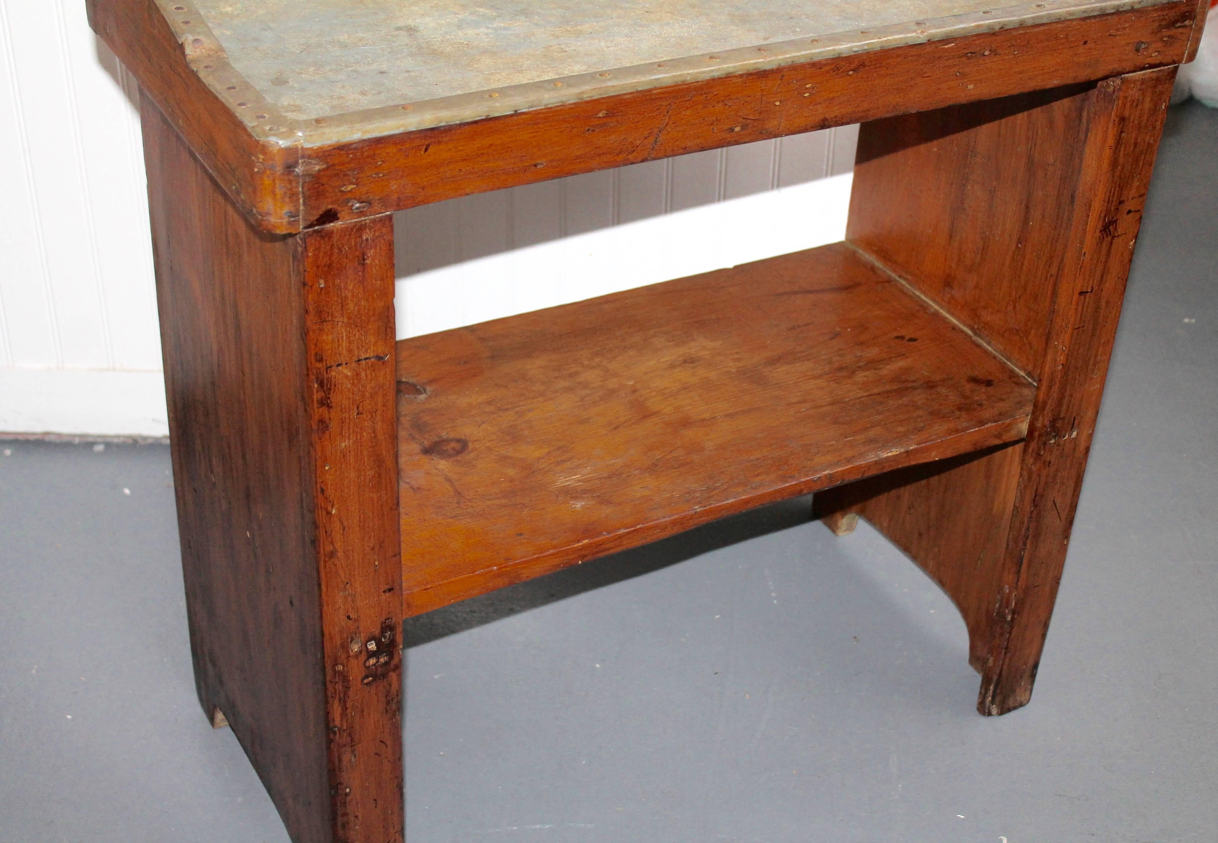This early and very unusual dry sink or potting table was found in Pennsylvania and is in nice, sturdy condition. Makes a great side table. Looks like a miniature bucket bench.