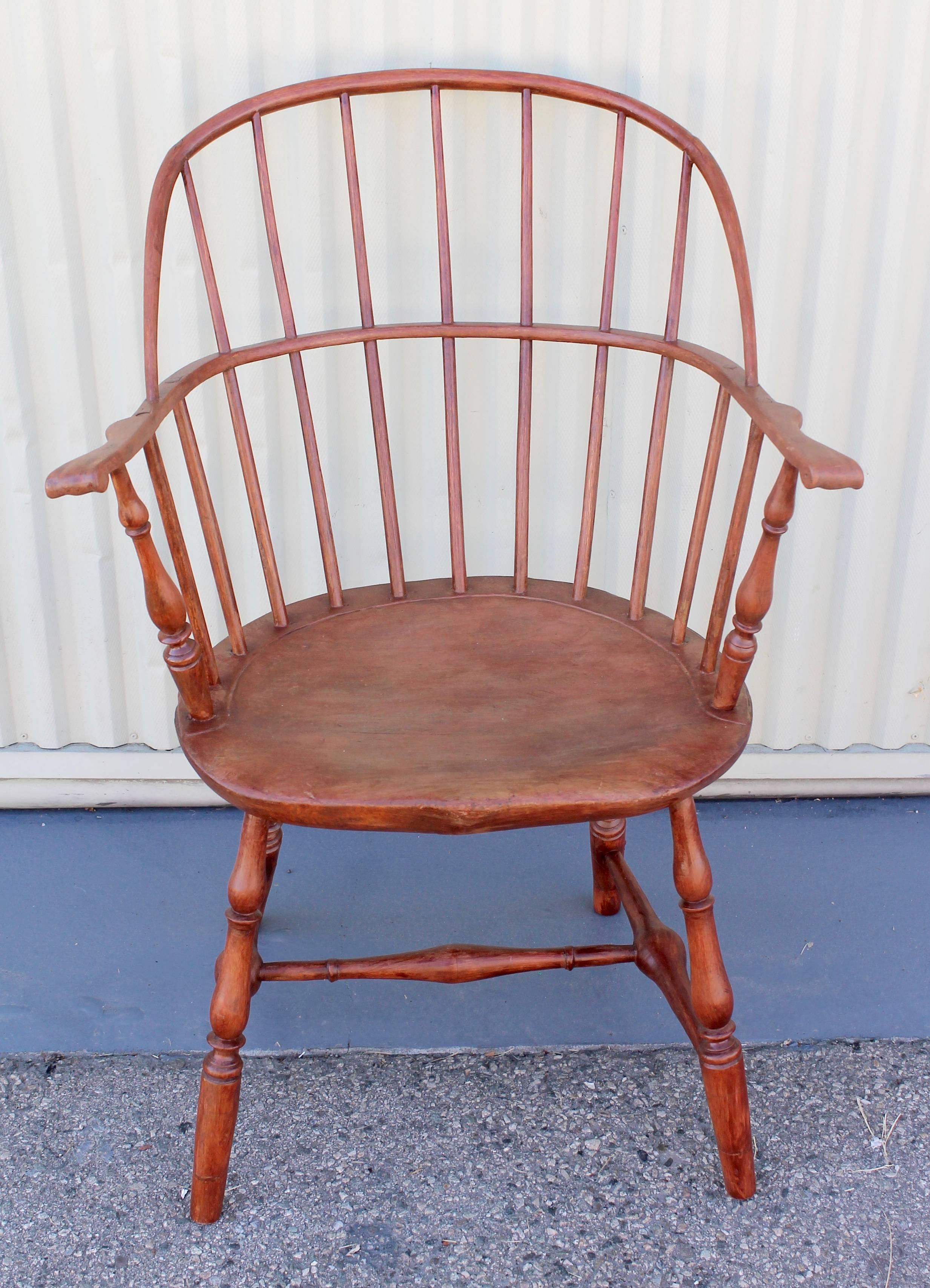 This fine American Windsor painted armchair is in great condition and has a wonderful worn painted surface. The patina is the very best.