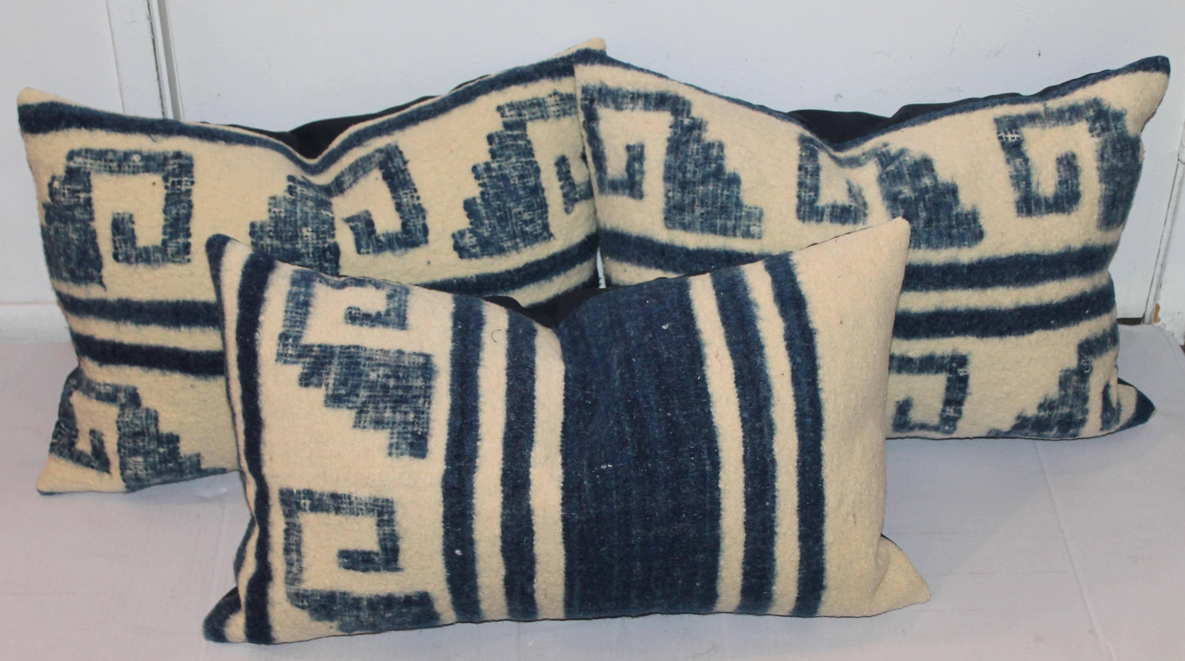 This collection of three weaving pillows is in a indigo and cream alpaca soft wool. The backing is in dark blue cotton linen. Sold as a group of three.