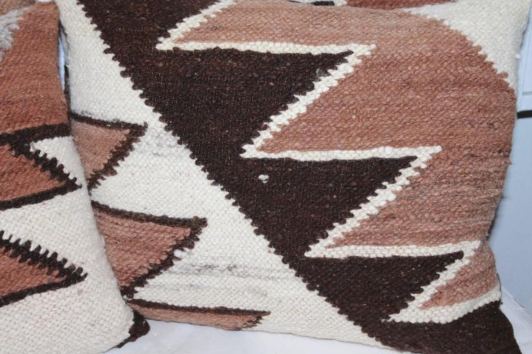 These fantastic and detailed weaving pillows are in great as found condition. We are selling them in pairs at 950 a pair. The backings are in brown and tan cotton linen.