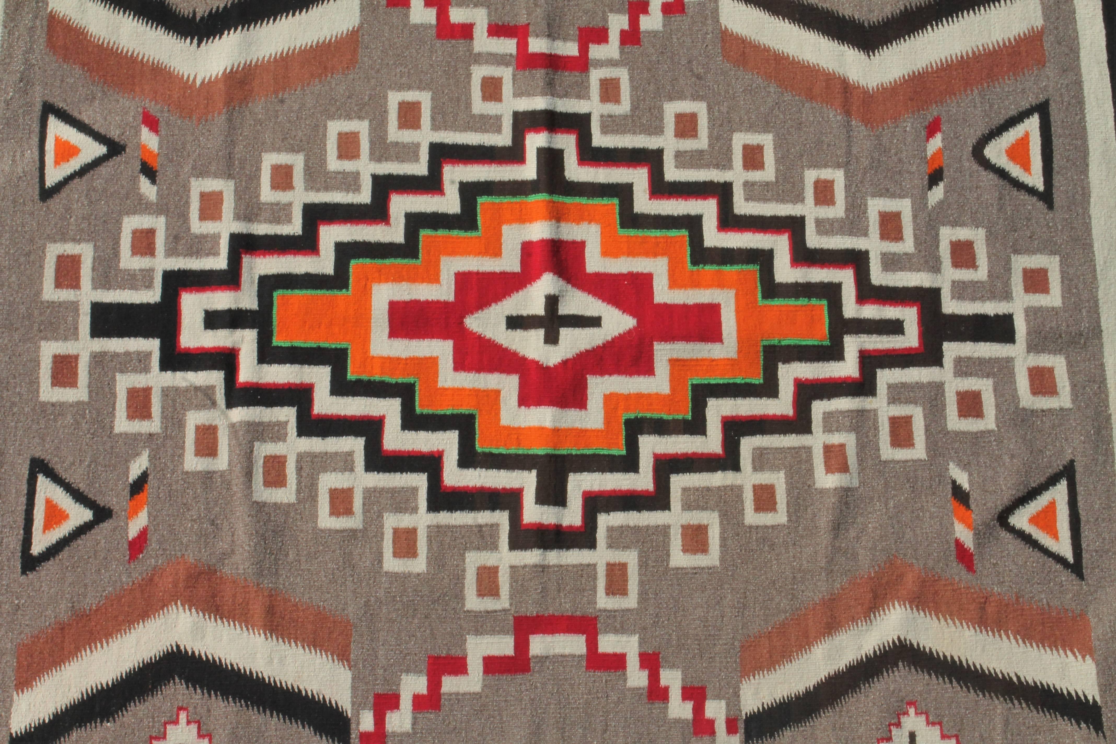 This amazing condition and colors Navajo transitional weaving is so pristine and great geometric pattern. This weaving has the original corner ties as well.