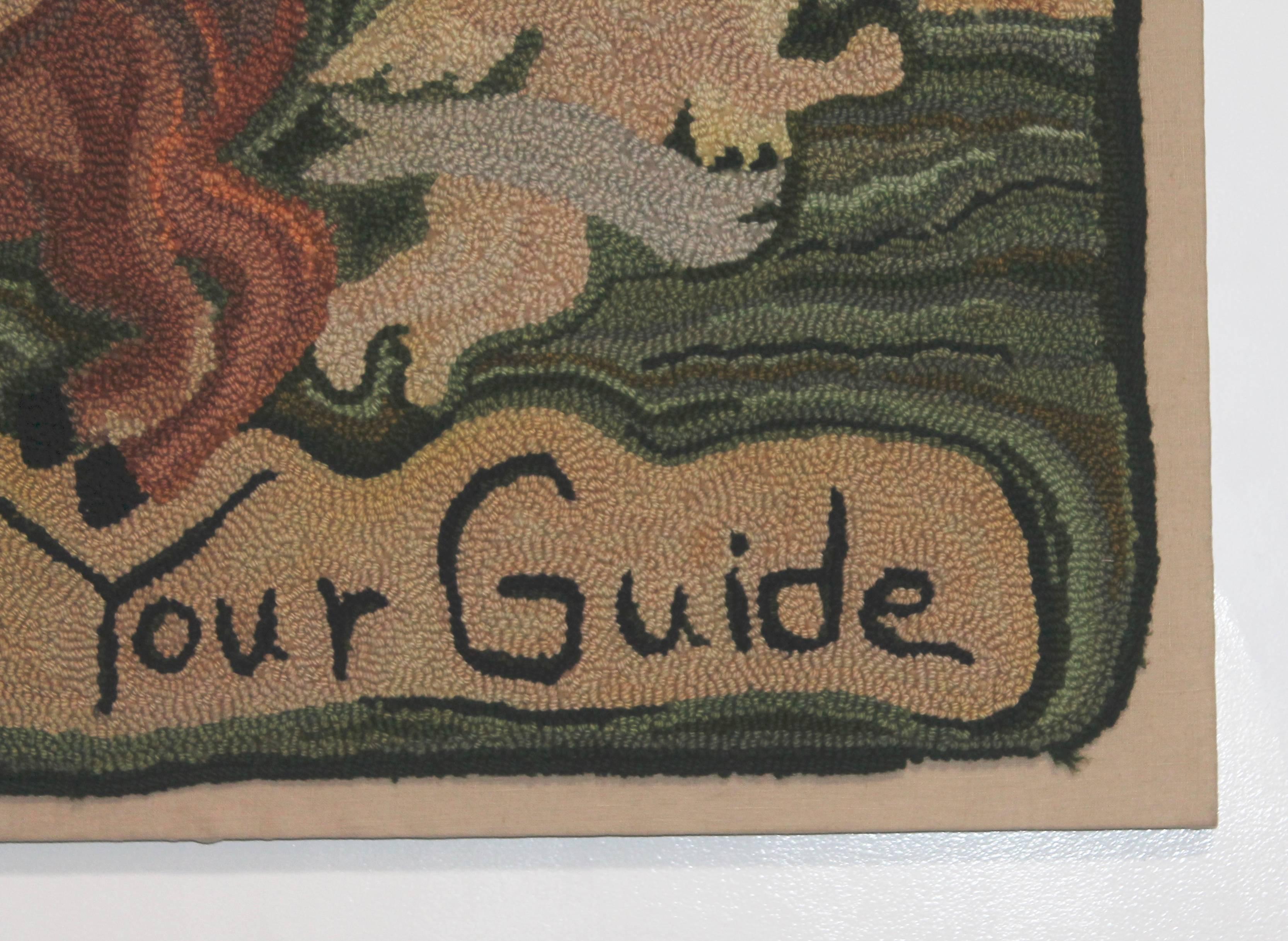 This hand-hooked folky rug is signed and dated by the artist. It is dated 9-26-1992. It reads "Let Love Be Your Guide" and shows the husband and wife with children in the forground. The condition is very good with hand-sewn on linen.