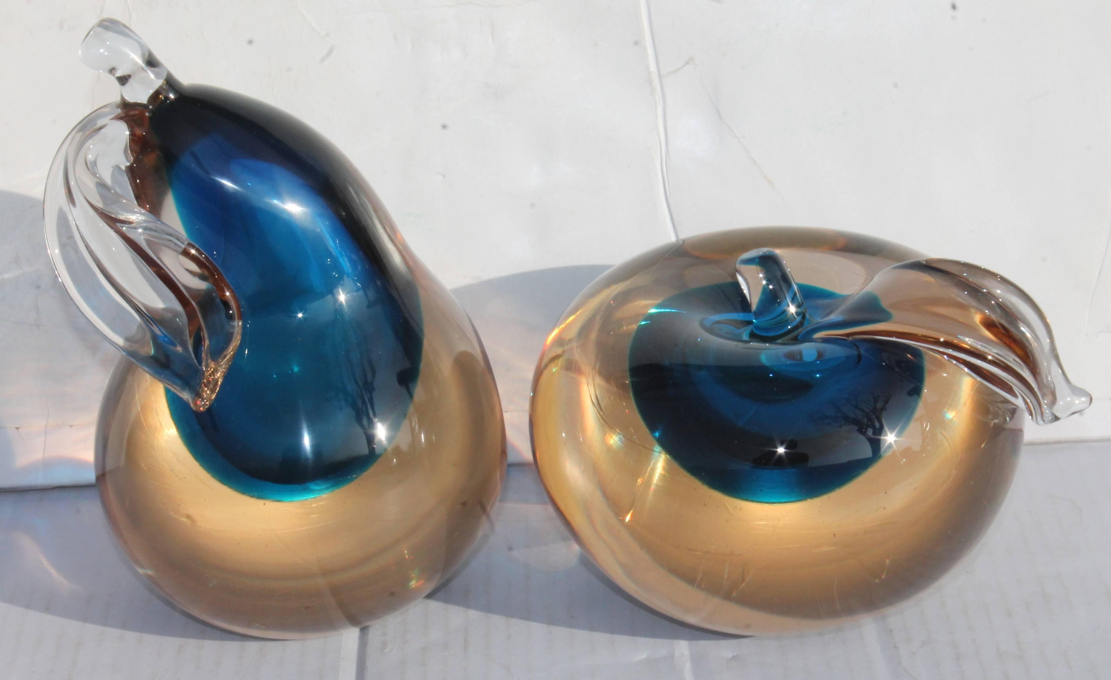 A two-piece bookend Murano Italian Art glass set in a thick exagerated glass. This set is in perfect condition and is a rare find. This Murano set may be used standing up or on its side.