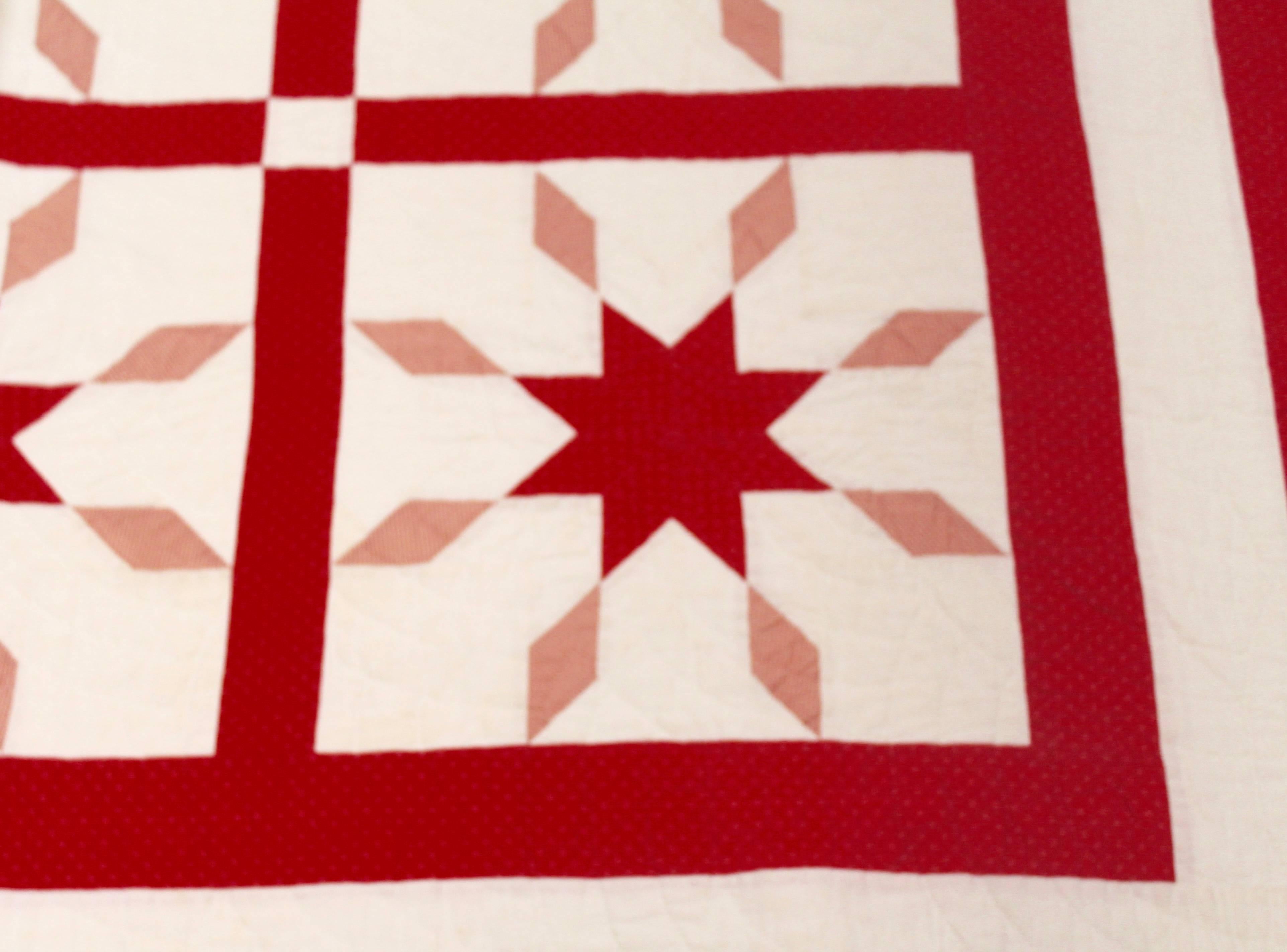 This hard to find large size broken star quilt is from Pennsylvania and is in fine condition. It has been professionally laundered and is signed by the maker. Her name is Pauline Sellers.