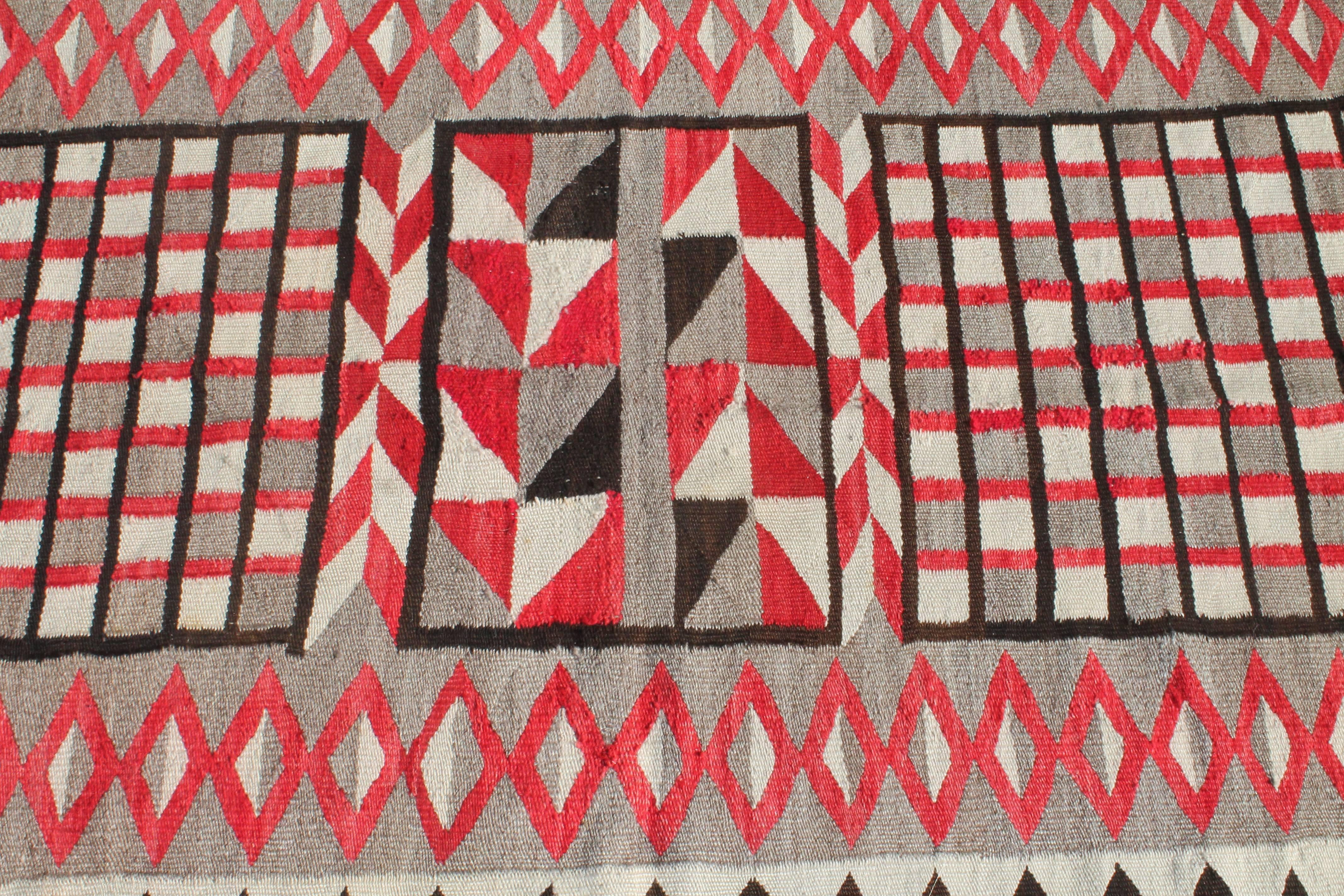 Early 20th century Ganada Navajo weaving in pristine condition. Highly geometric, good condition with great colors.
