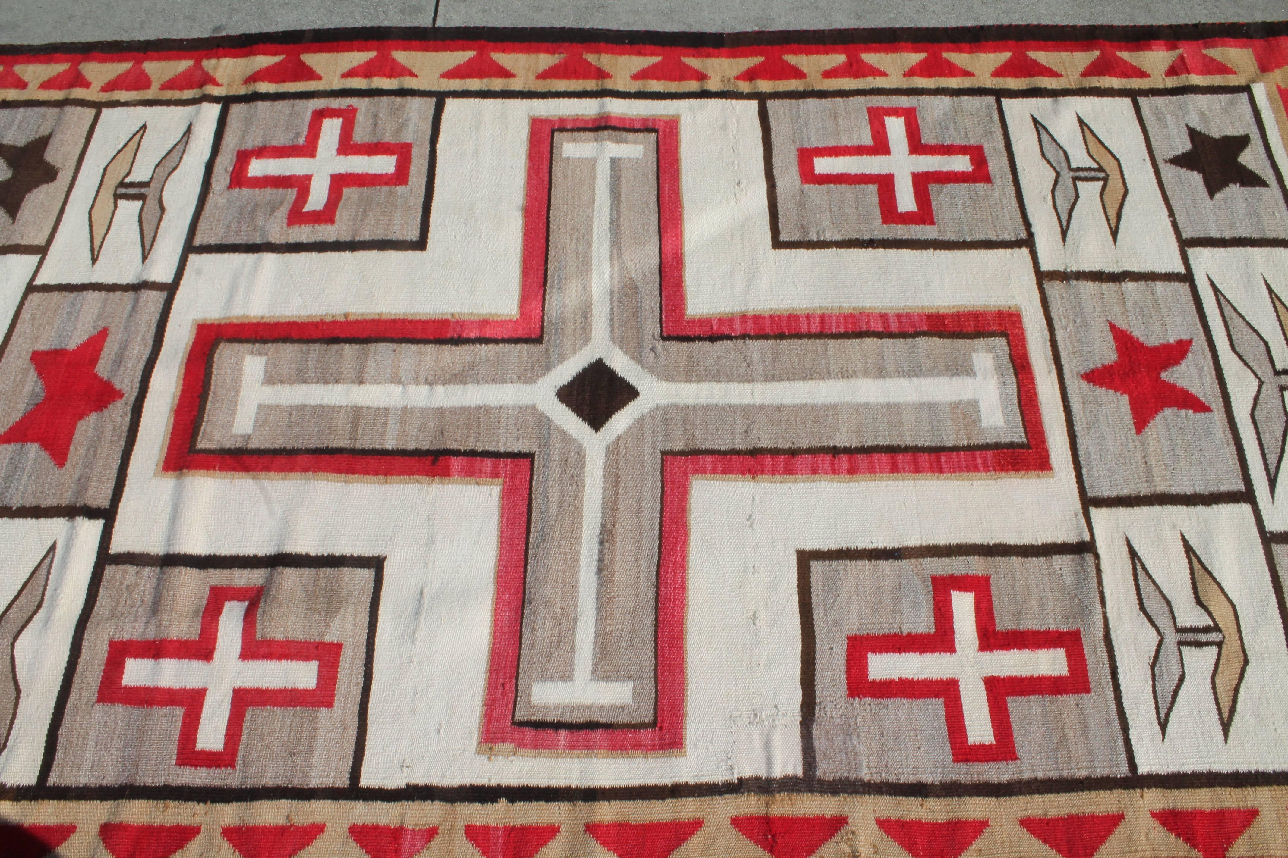 1920s crystal Navajo weaving, circa 1920s. This weaving has minor wear consistent with age and use. This is a room size rug in great condition.