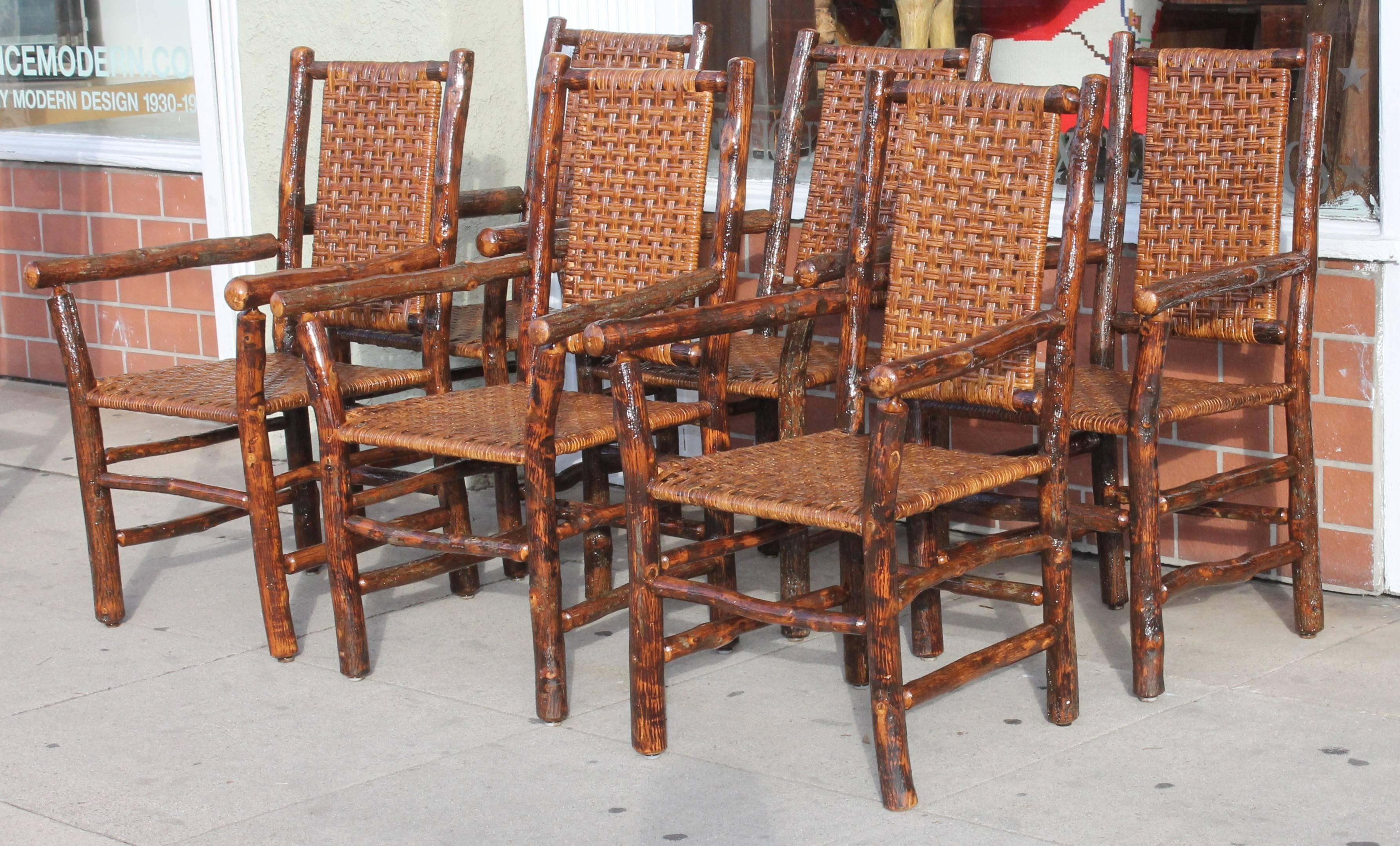 Set of six signed Old Hickory Furniture Company , Shelbyville, Indiana. They are signed on lower left inner leg. The cane seat and backs are all original and in fine condition. The chairs are in amazing condition. We have a over varnished the set