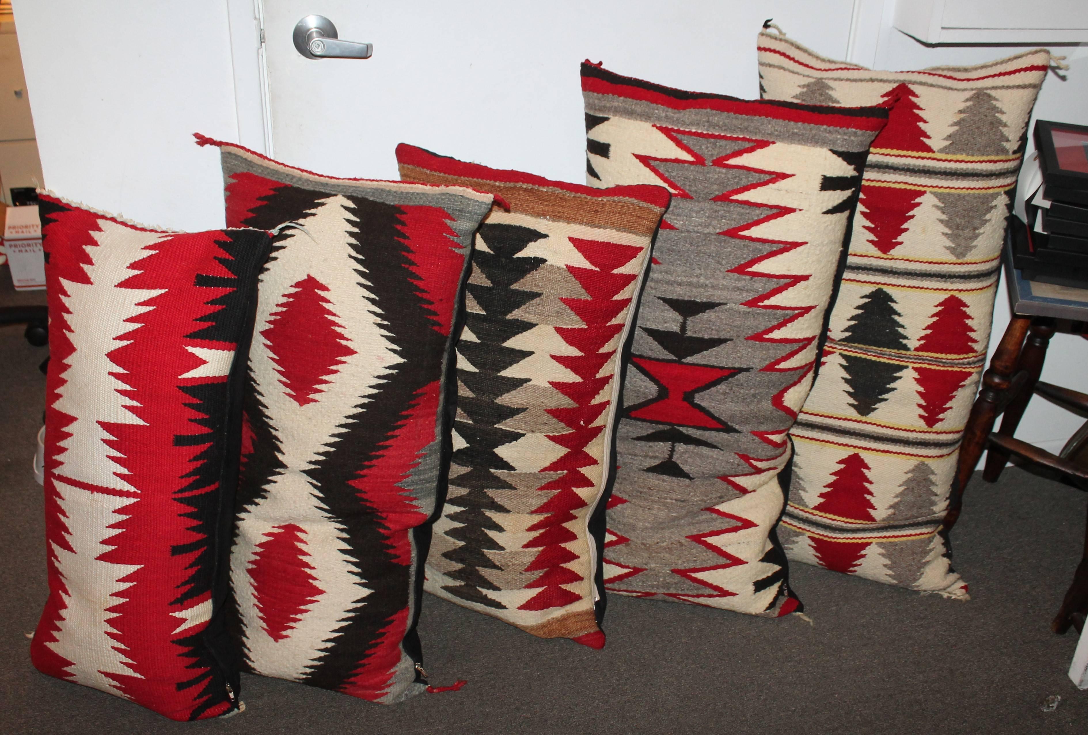 These amazing bolster pillows are all in very geometric patterns from flying geese to eye dazzlers. The backing of all saddle blanket weaving's are in black cotton linen. Sold individually @ 975.00 each or package price of 3895.00 for the collection