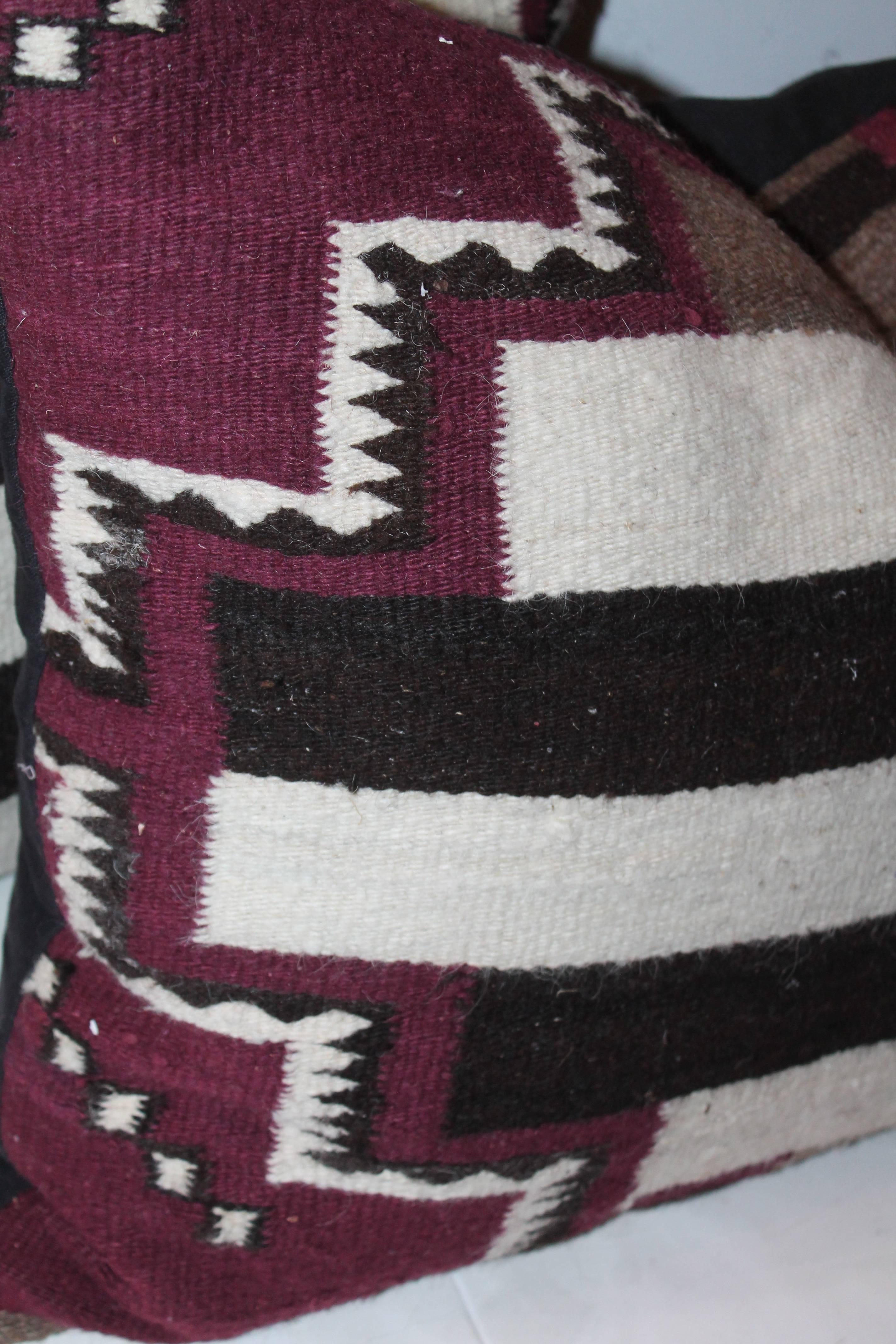Patinated Pair of Navajo Weaving Bolster Pillows