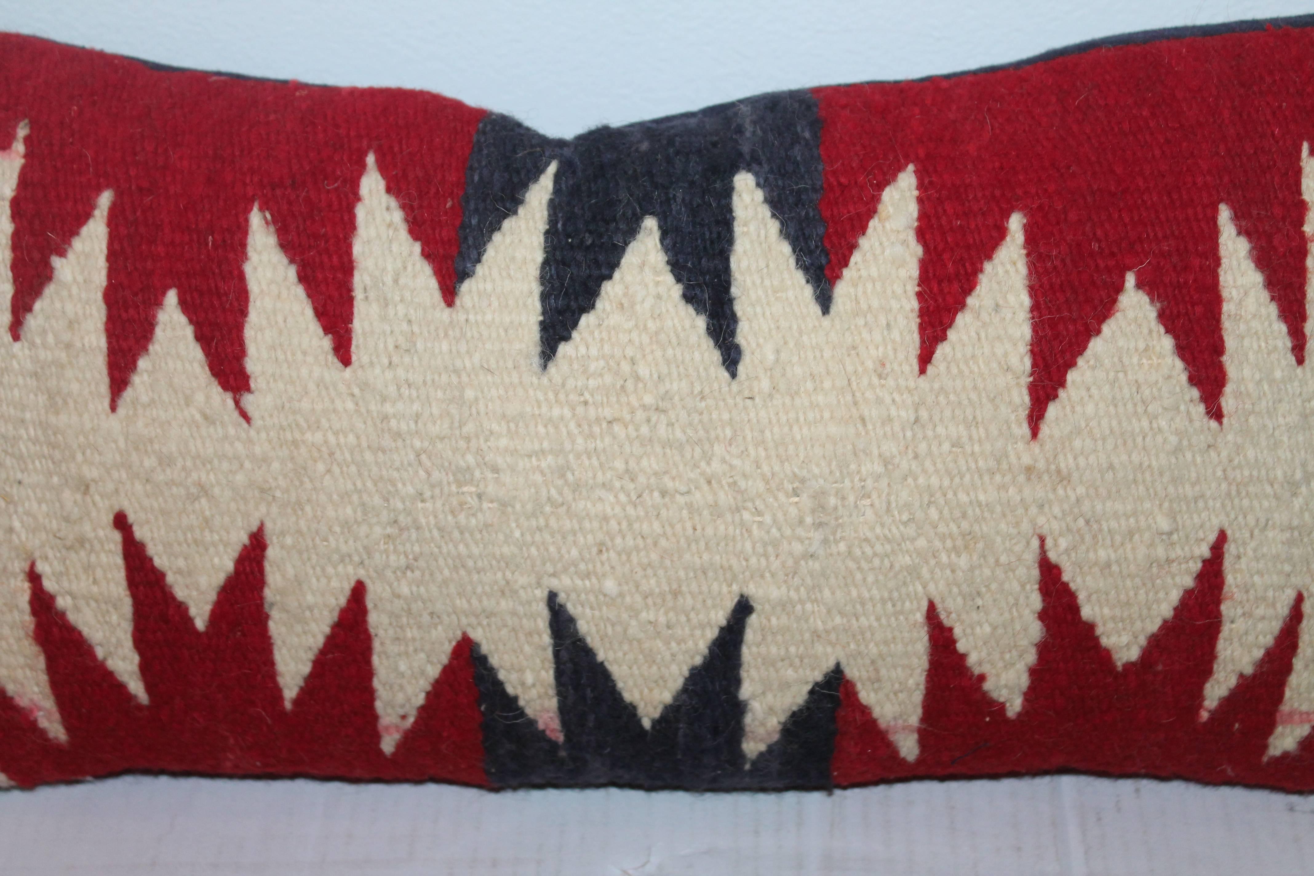 Fantastic geometric Navajo Indian weaving pillow with original fringed border. The backing is in a dark grey cotton linen.