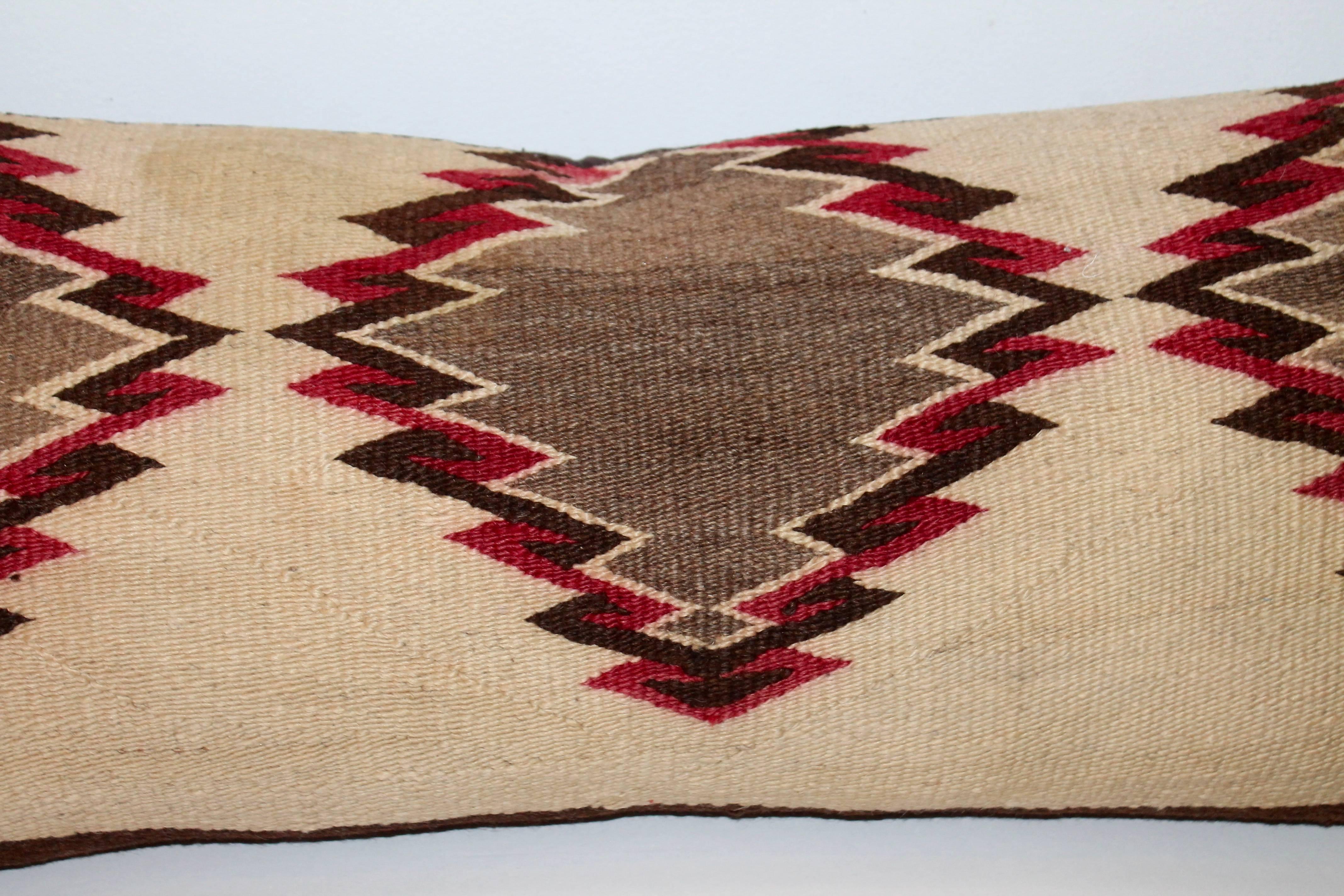 This geometric early weaving is in fine condition with most unusual colors of mauve and tan. The backing is in a brown cotton linen.