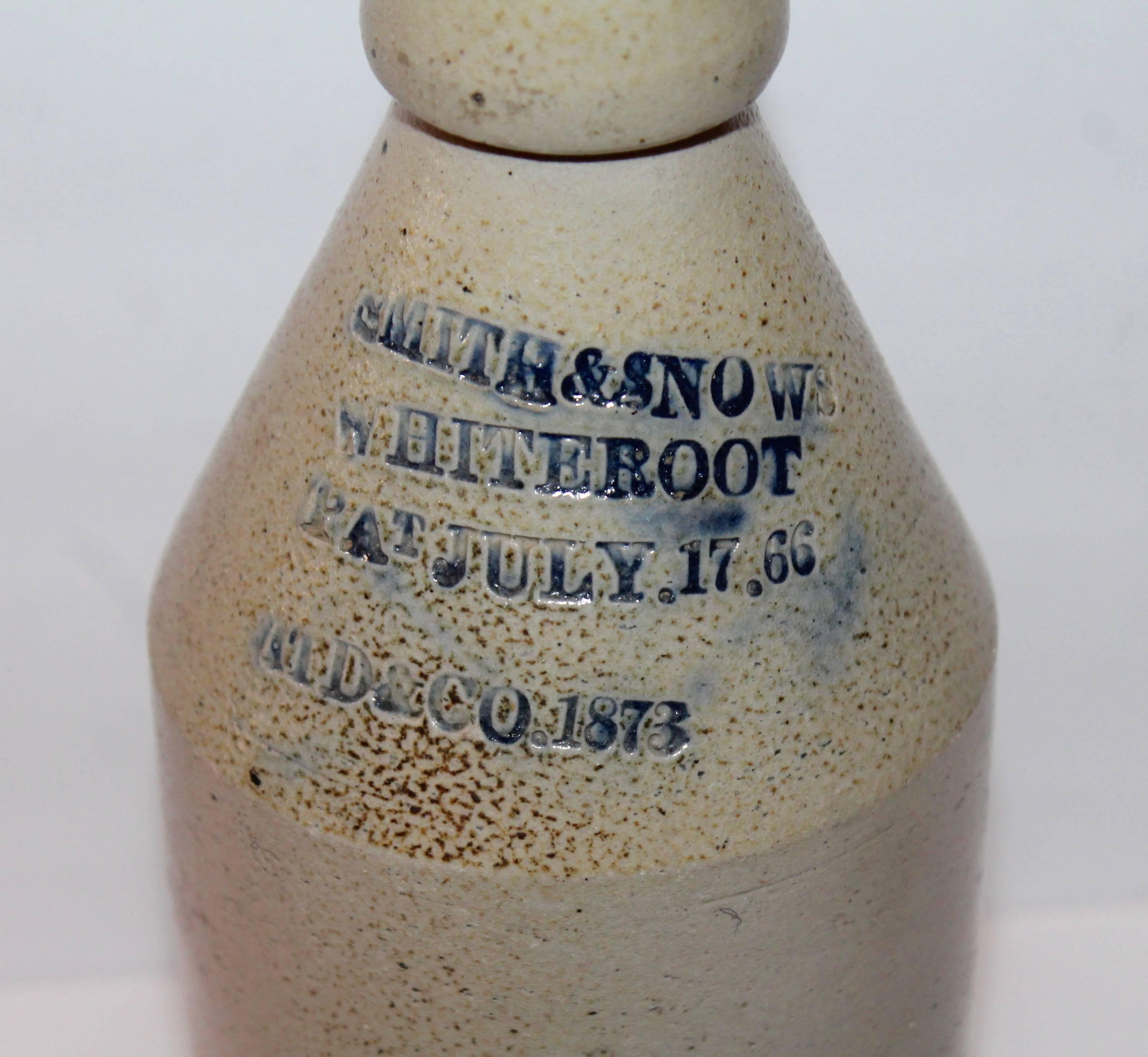 This early handmade pottery bitters bottle is signed and dated by the maker Pat. July. 17. 66 and Patd. & Co. 1873 . This pottery bottle is in pristine condition.