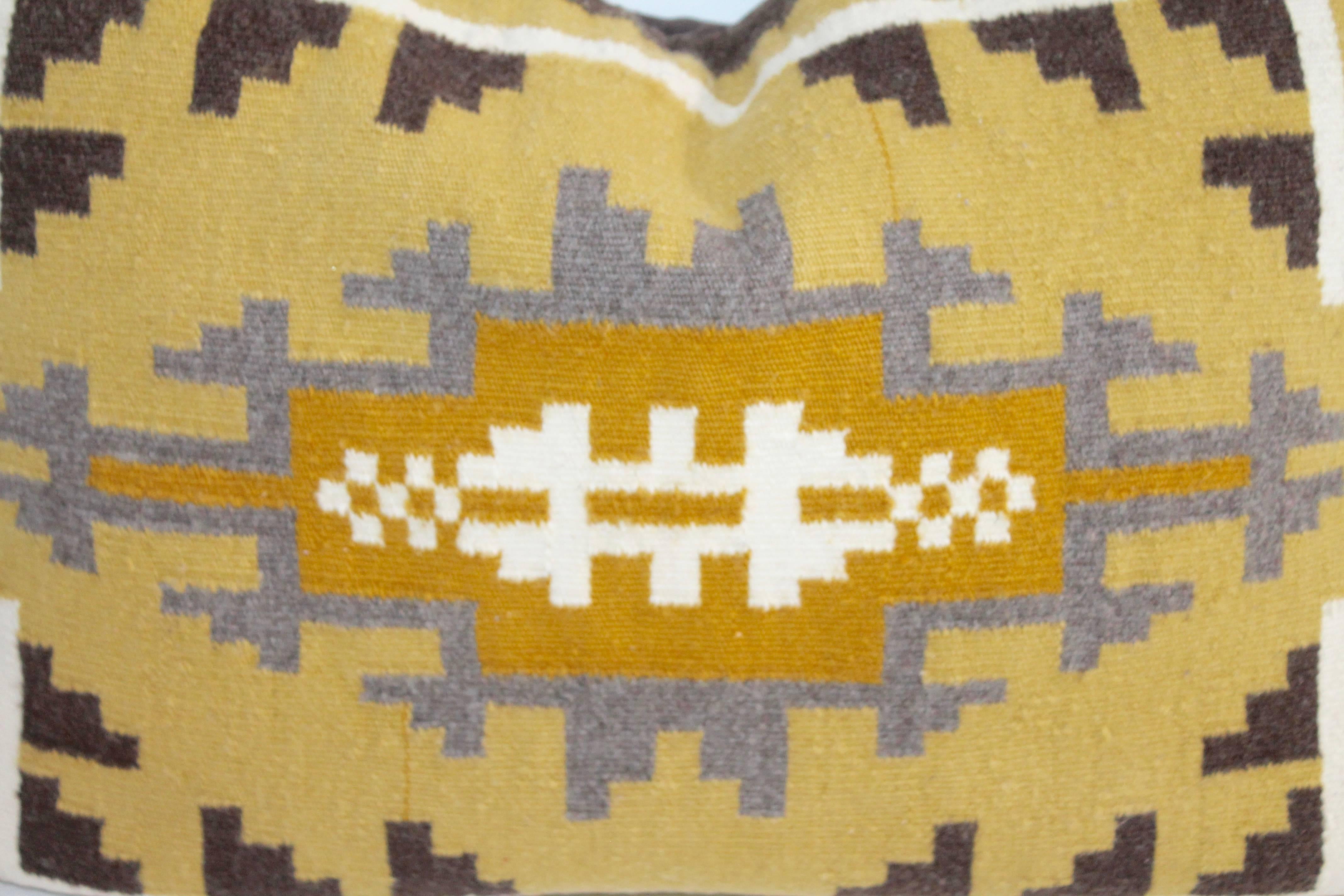 Fantastic geometric Navajo weaving bolster pillow. Great unusual colors. The backing is in brown cotton linen.