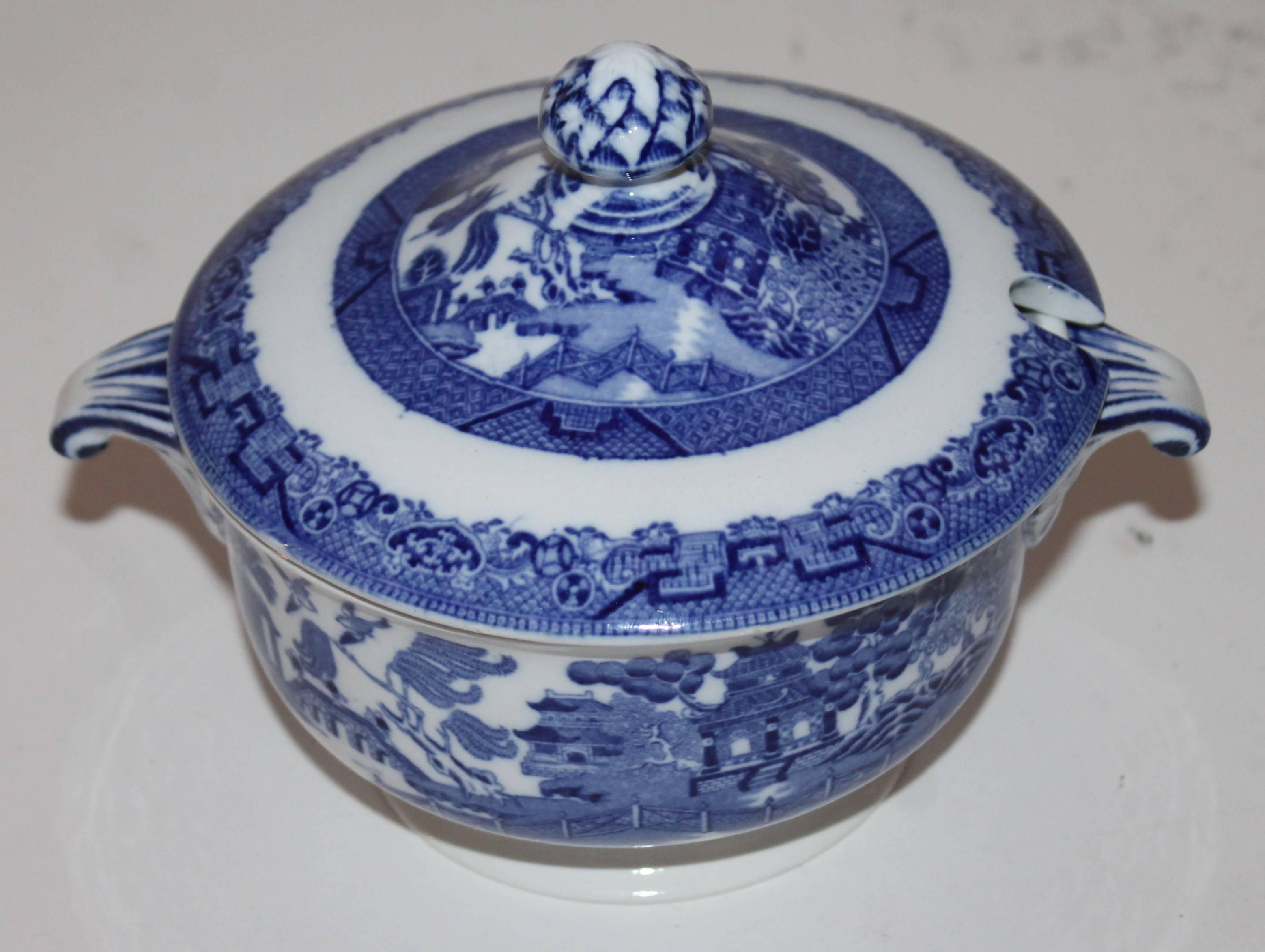 Beautiful blue willow serving dish lidded with finial in amazing condition. This serving dish is stamped Mintons.

