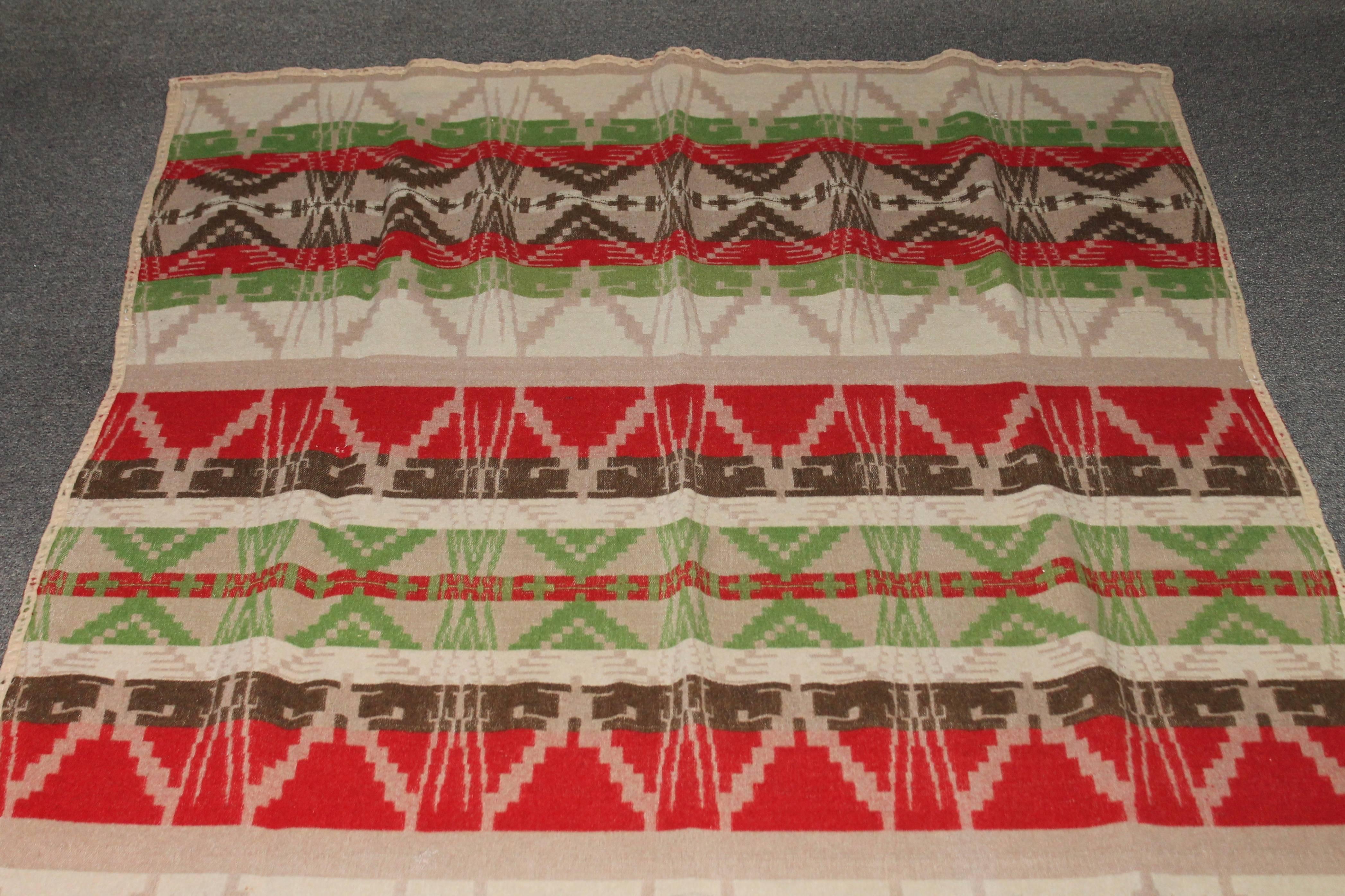 This early Pendleton Cayuse Indian camp blanket has the original wool binding and is in good as found condition.