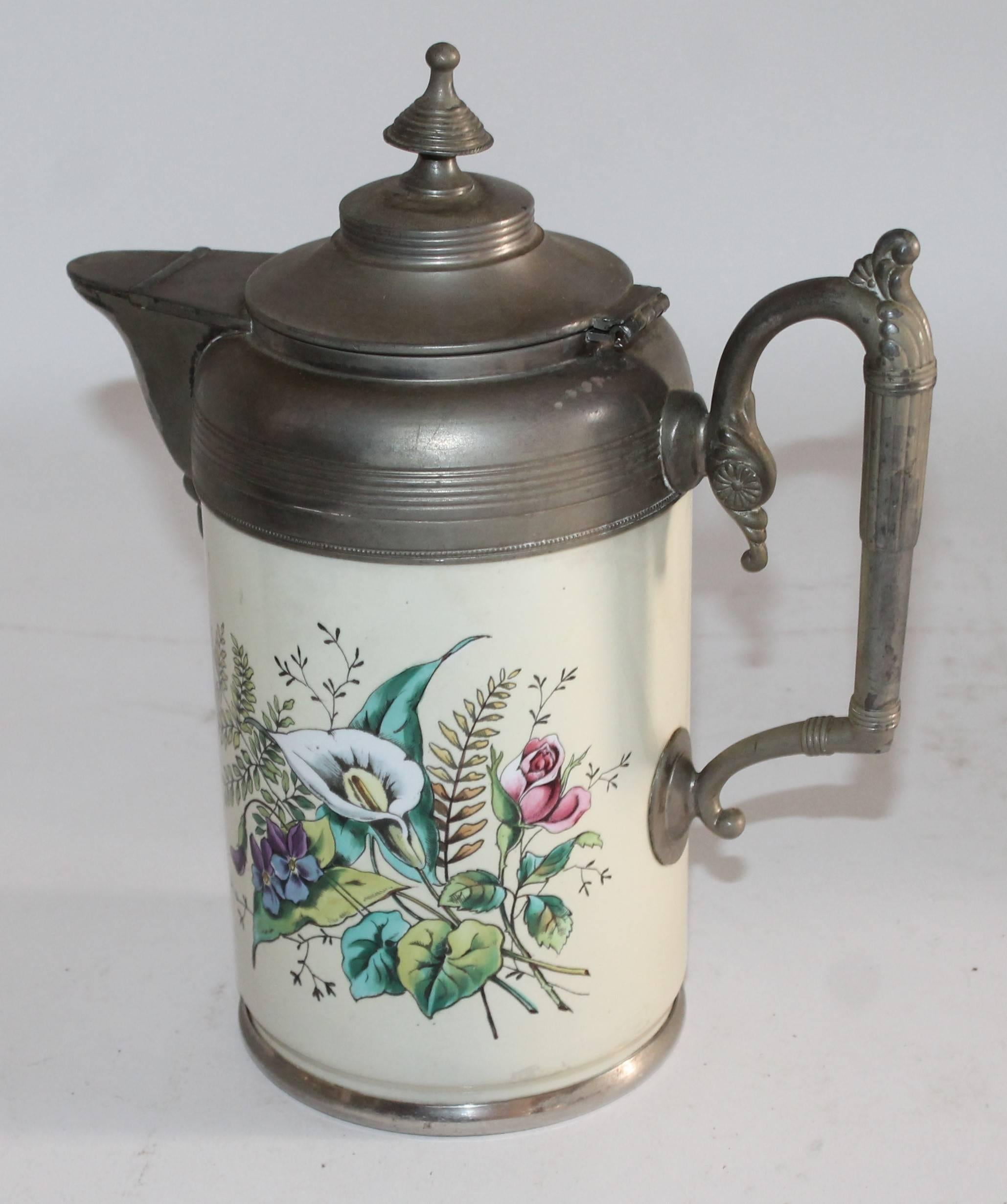 This very rare hand-painted and decorated pewter coffee pot is in amazing as found condition.