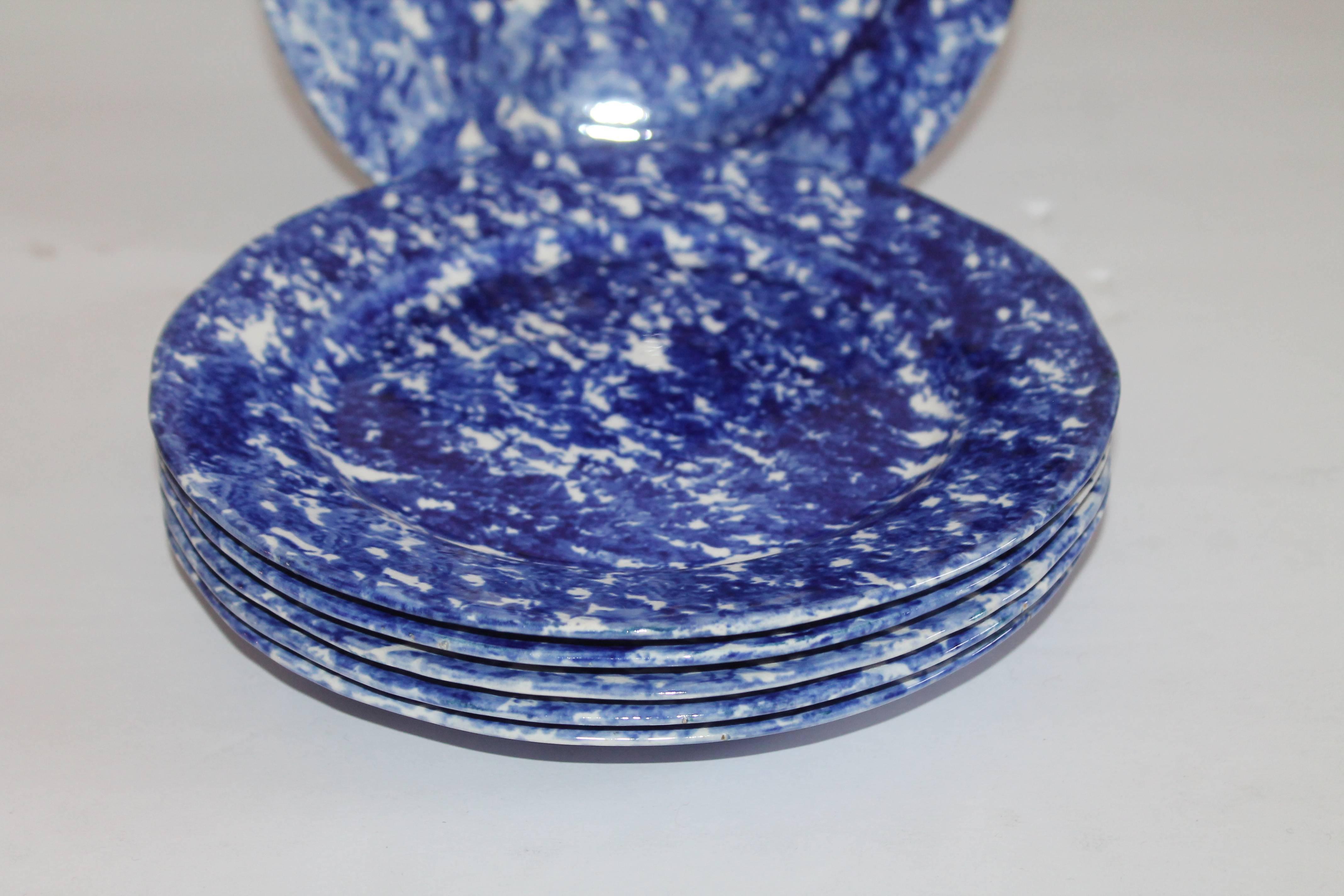 These amazing hand-painted and glazed American sponge ware plates are a perfect matched set. They are in pristine condition.