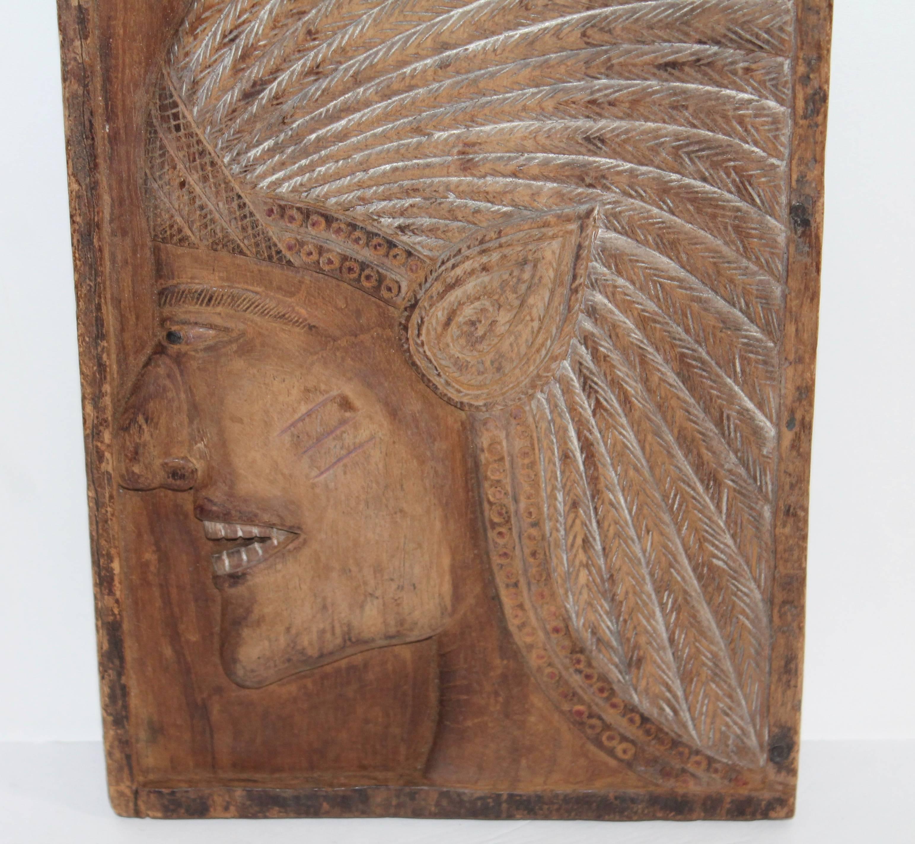 This very folky hand-carved Indian chief plaque is in great condition. This folky Indian is very well detailed carving. The condition is very good.