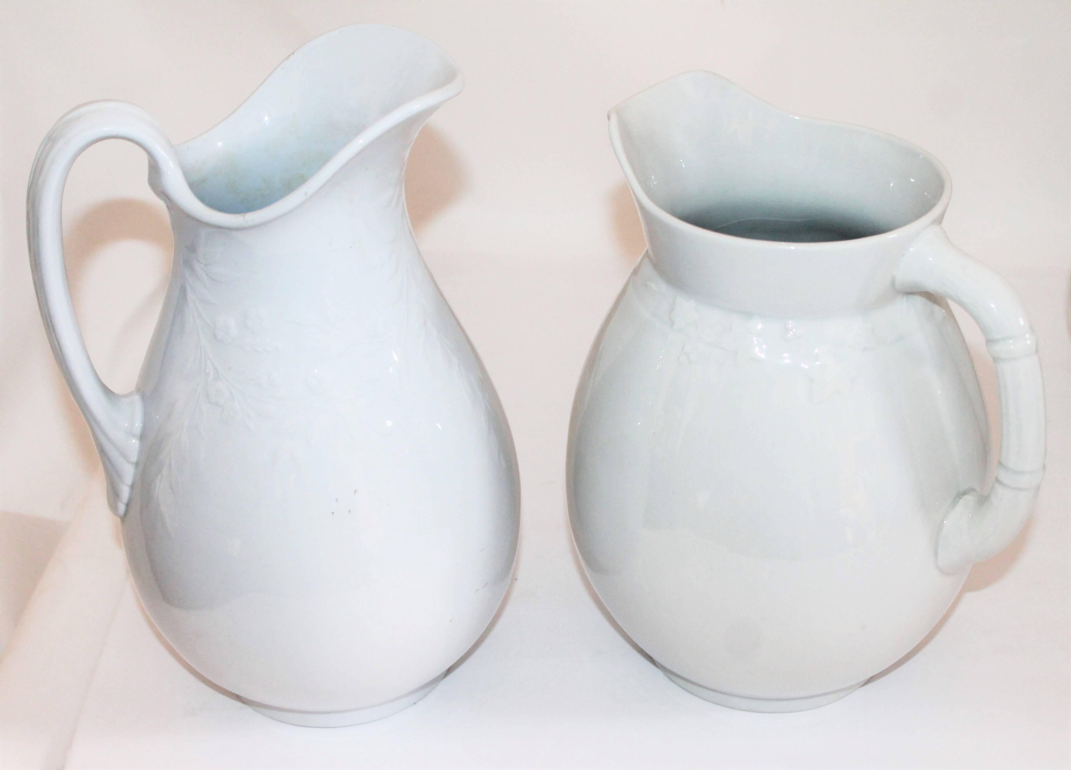 Molded Collection of Four 19th Century Iron Stone Pitchers