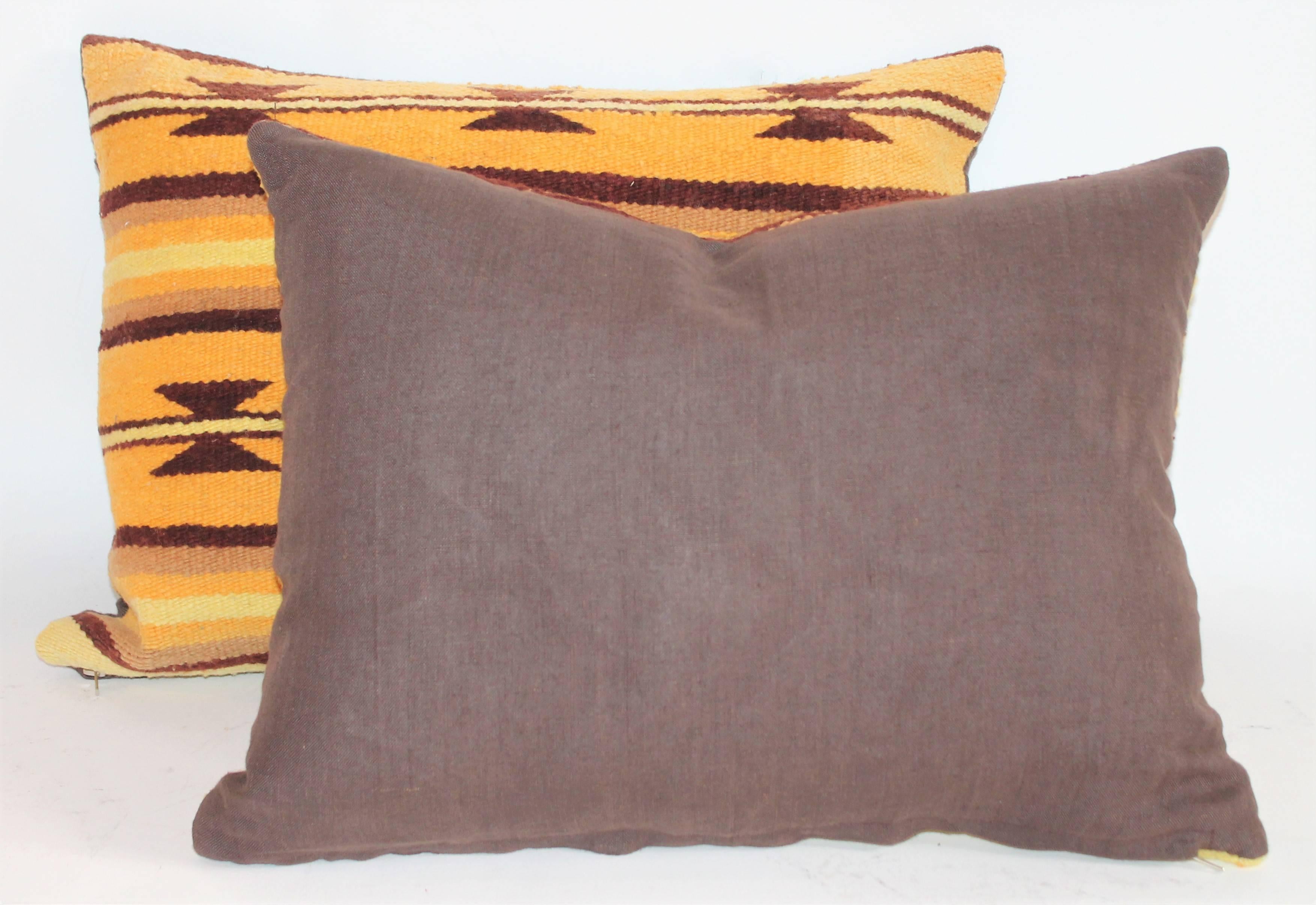 Hand-Woven Pair of Mustard and Brown Navajo Indian Weaving For Sale