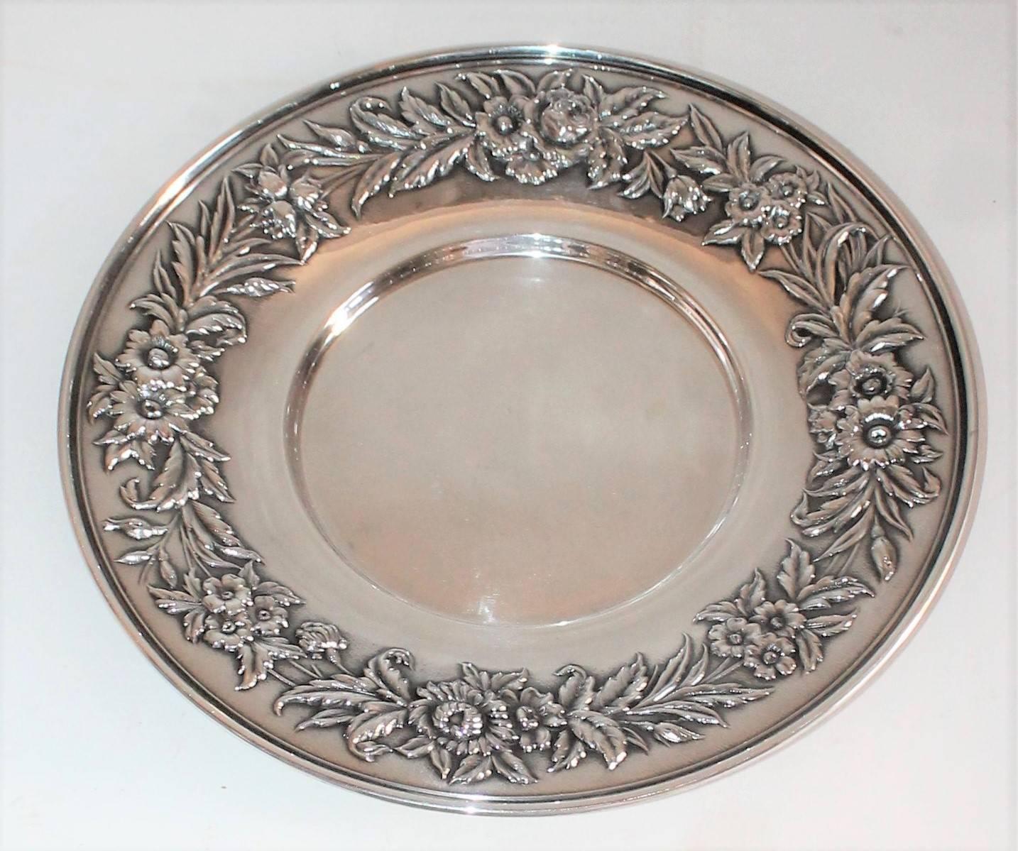 These two fancy pieces of heavy Kirk sterling silver serving oval bowl and round serving platter are in pristine condition and are both signed S.KIRK & SON STERLING. Nice heavy weight.