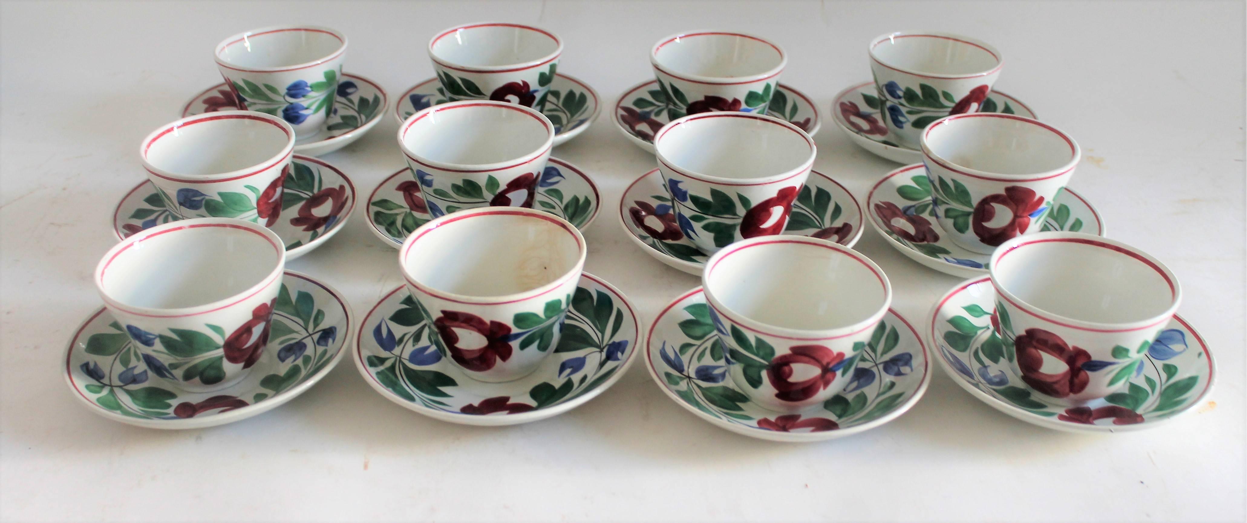 This amazing set of 19th century stick spatter, Adams Rose pattern cups and saucers is in fine condition and is service for twelve. Highly collectable in the East Coast. All twenty four pieces are in pristine condition.