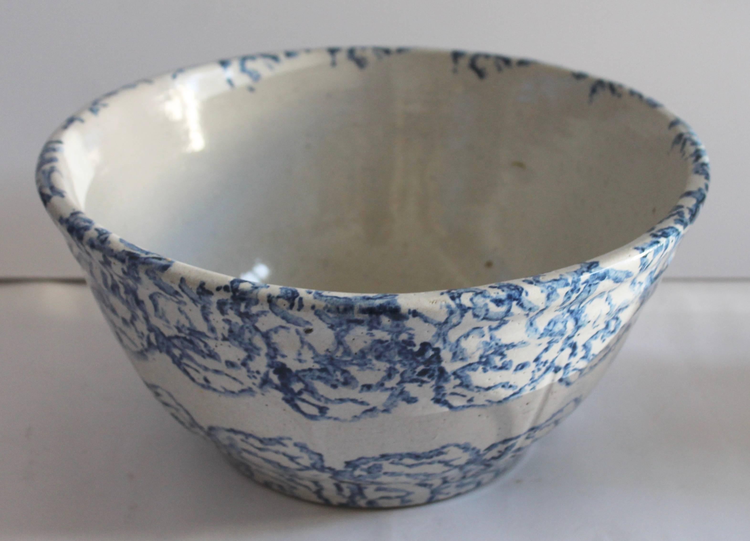 This amazing large spongeware bowl is in pristine condition and has a design sponge pattern or clam shell pattern. It is great as a fruit bowl or center piece bowl on your dining room or kitchen table.