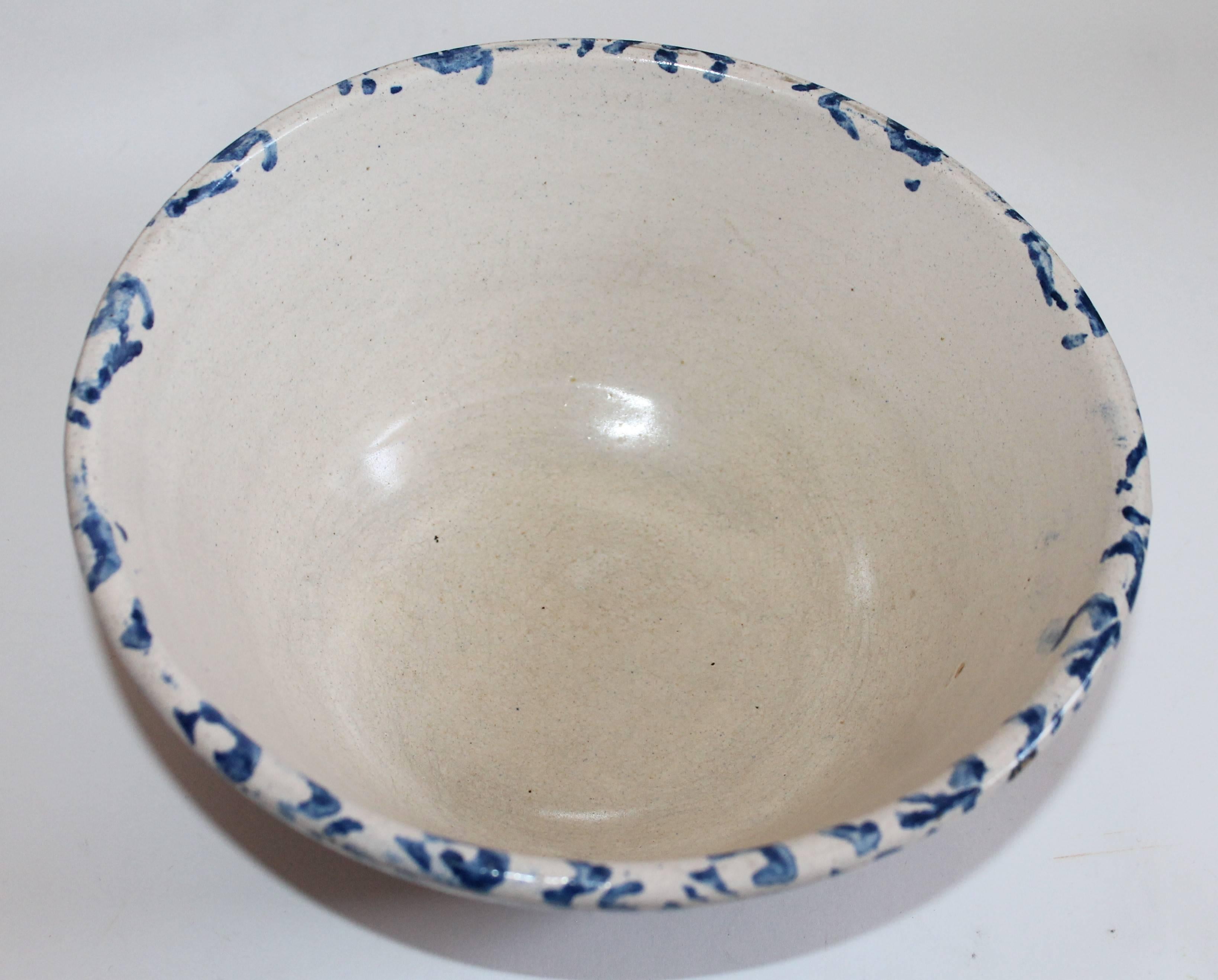 19th century blue and white sponge ware mixing or batter bowl. With clam shell design. The condition is mint.