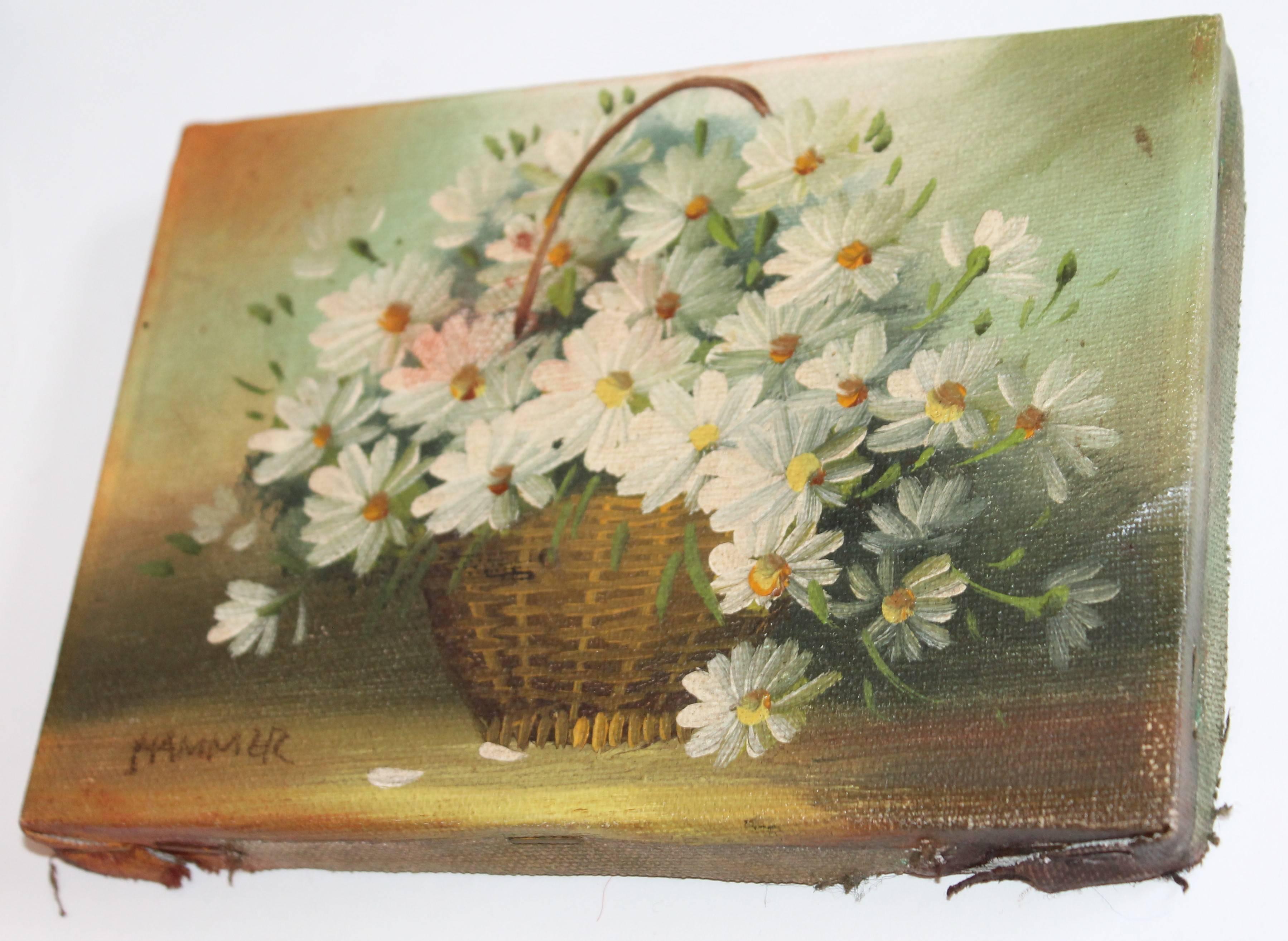 This fantastic little wonder is signed HAMMER and is a country mustard painted basket filled with flowers. Fantastic details and work.
