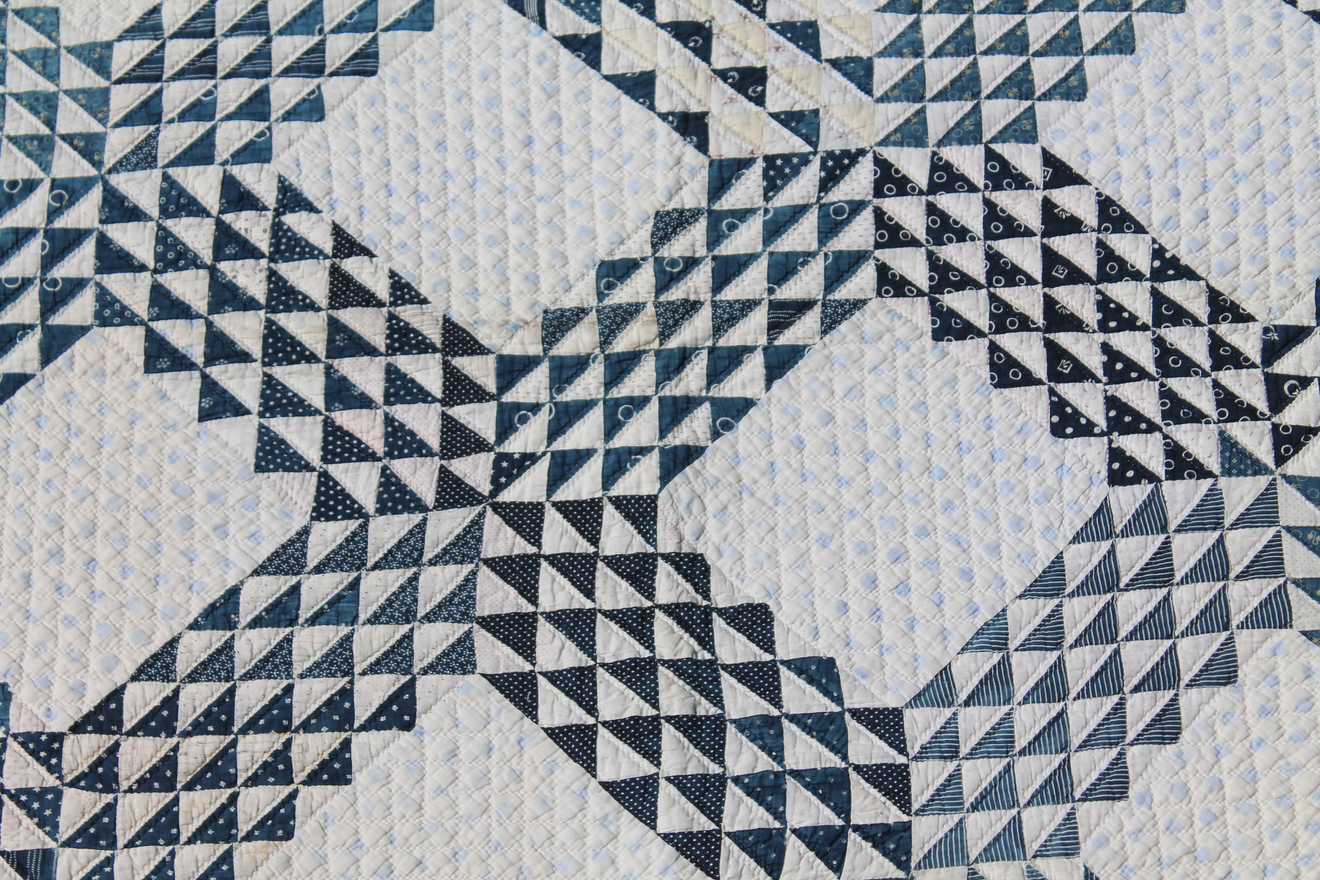 This finely pieced and quilted ocean waves quilt is in wonderful crisp condition with over even faded or muted surface. There is a small area in photo space that was a old minor repair. This quilt was freshly hand washed and cleaned. Nice small