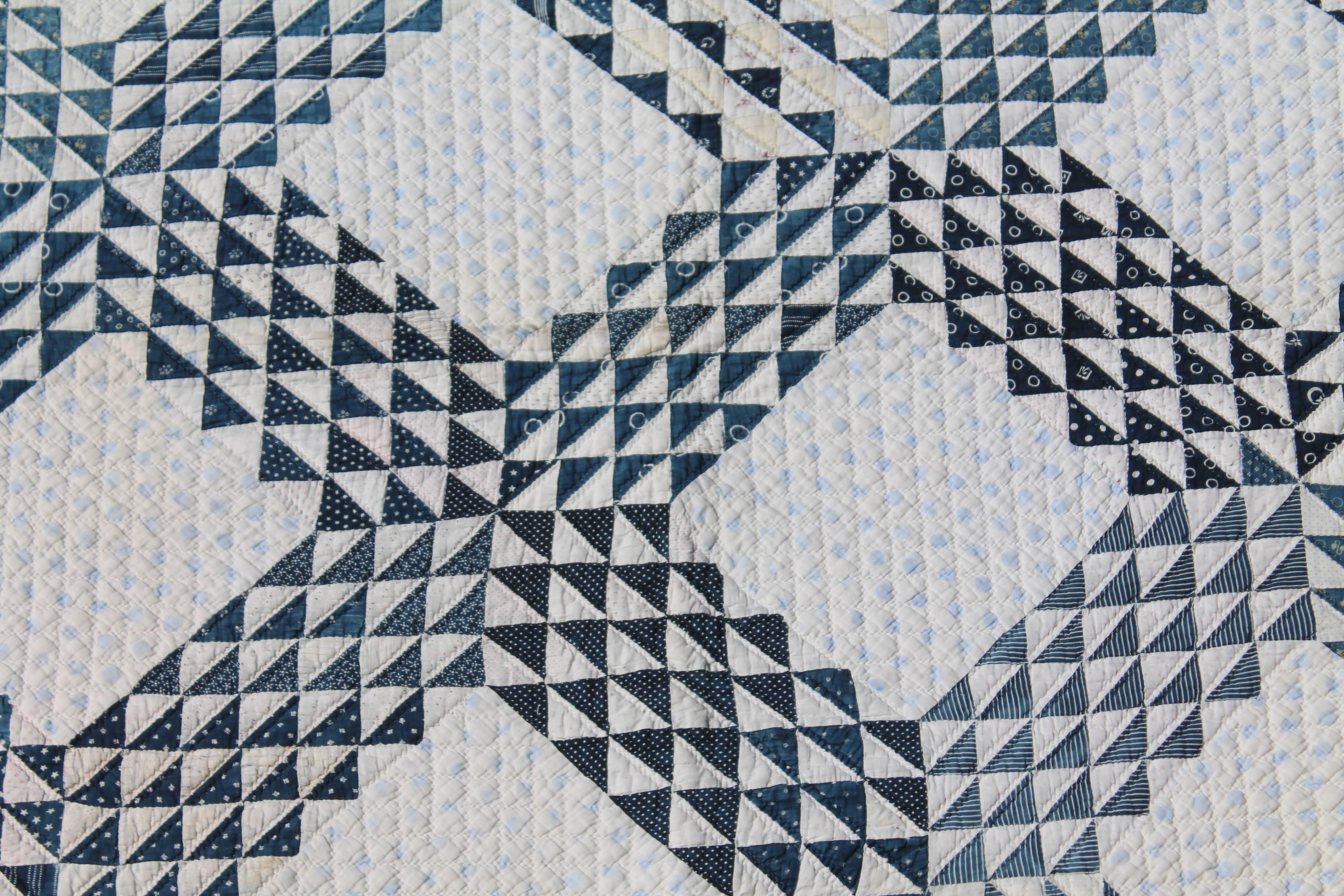 This finely pieced and quilted ocean waves quilt is in wonderful crisp condition with over even faded or muted surface. There is a small area in photo space that was a old minor repair. This quilt was freshly hand washed and cleaned. Nice small