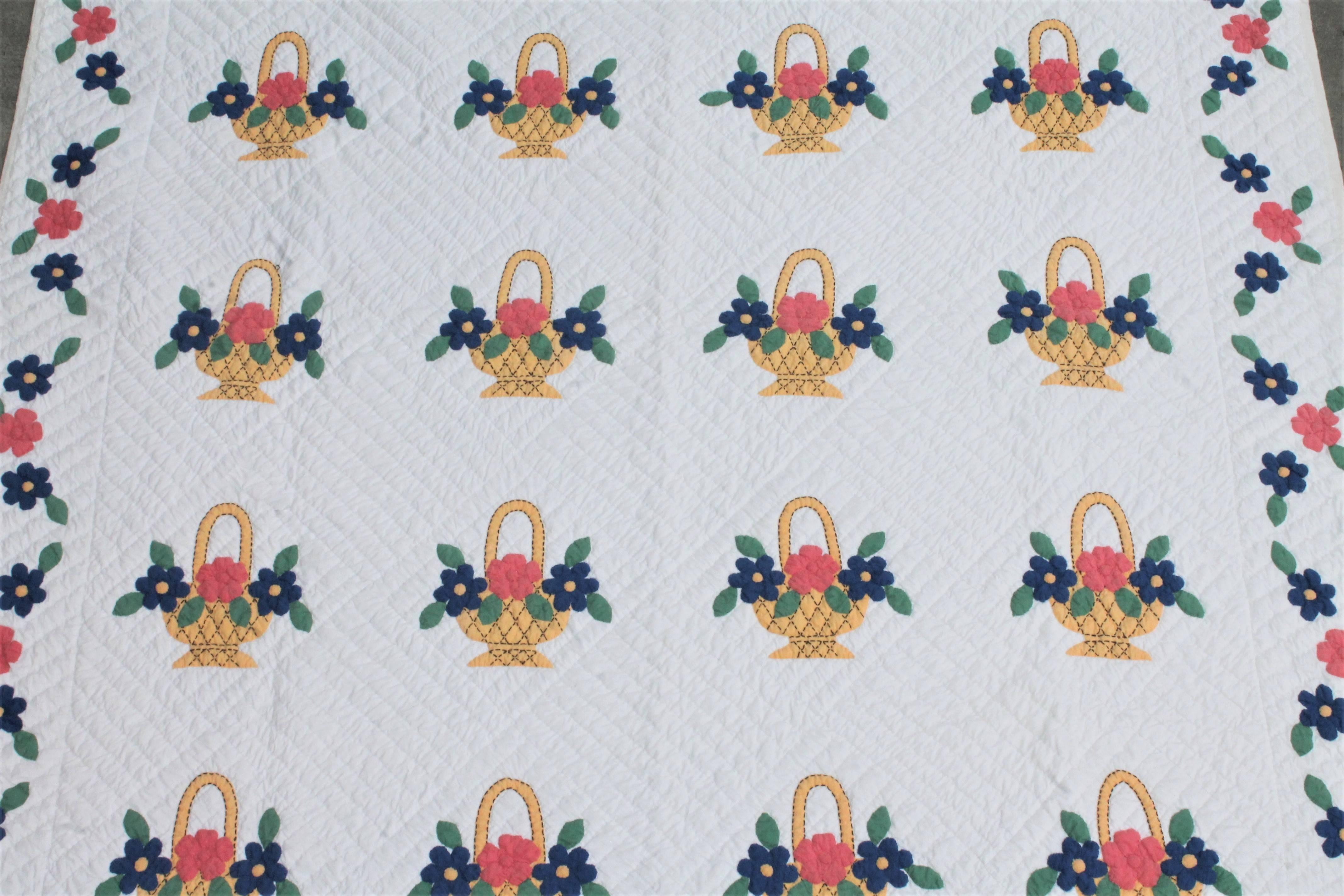 This 1930s applique pastel basket quilt is in good condition and very large in size.