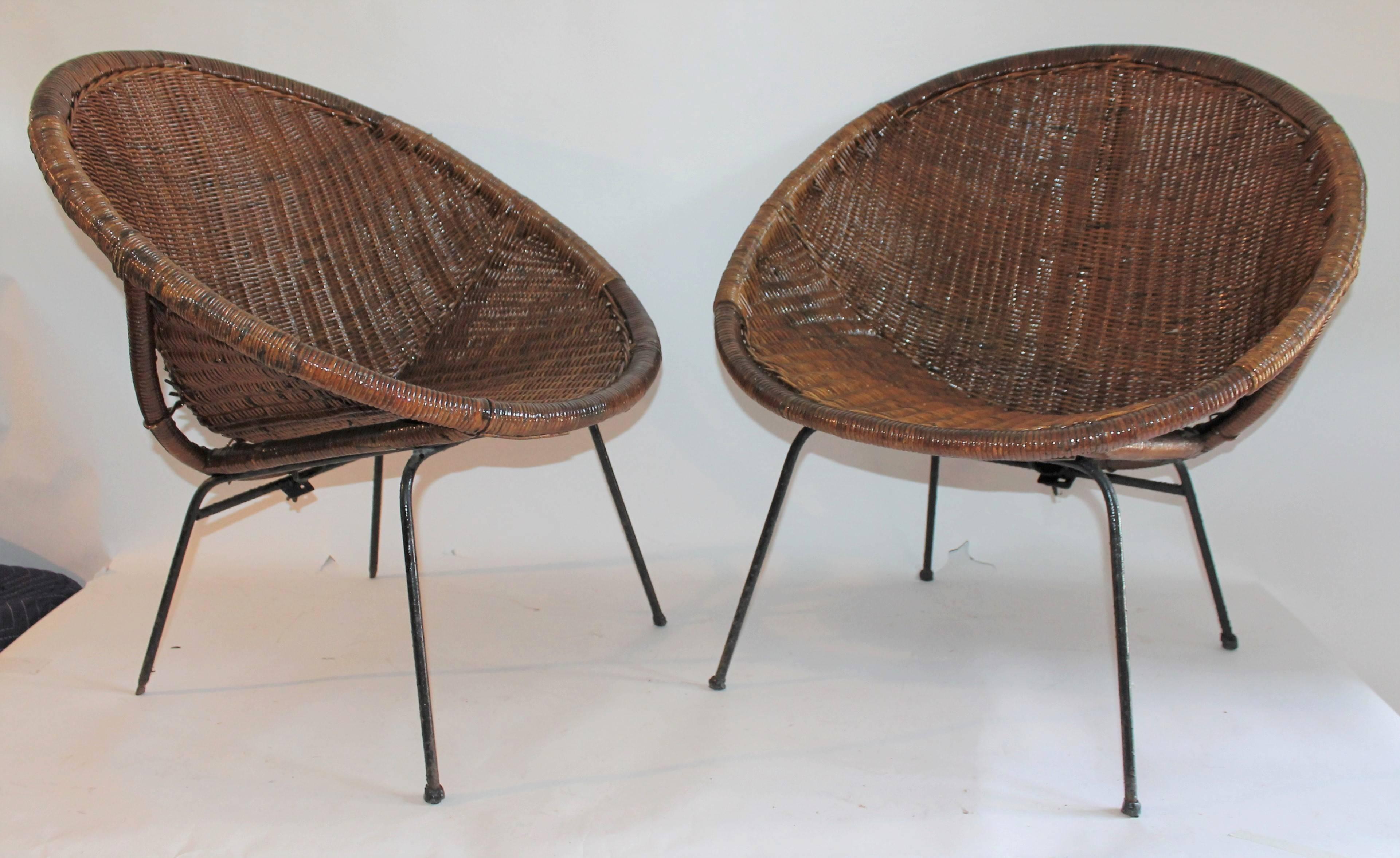 This fine and simple rustic wicker cone style chairs with a natural rustic patina are in fine condition. This set goes great with old hickory furniture and also stream line modern as well. They have the iron post legs on all three pieces. Measure: