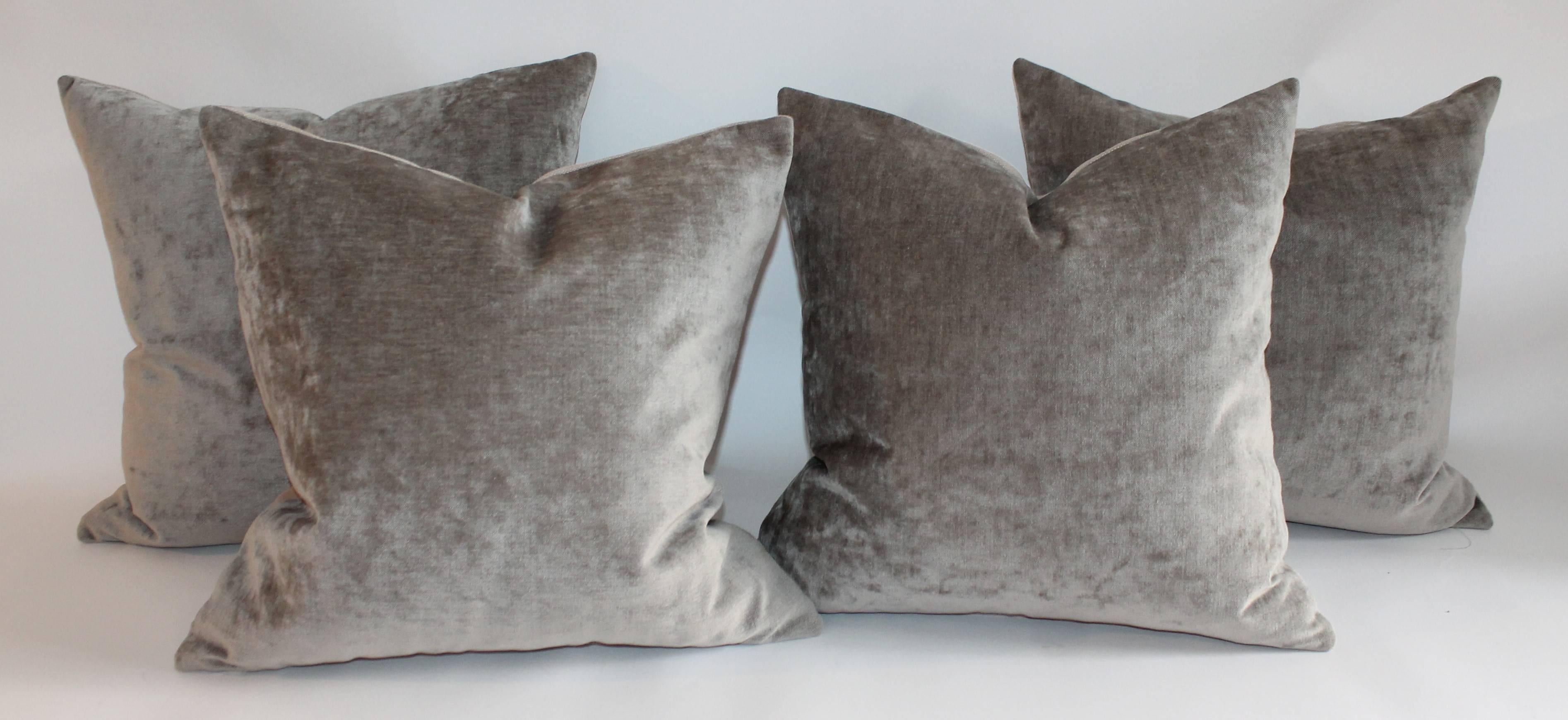 These olive or sage green velvet pillows are in amazing condition and are sold in pairs. The backings are in a taupe cotton linen fabric. There are three pairs in stock.