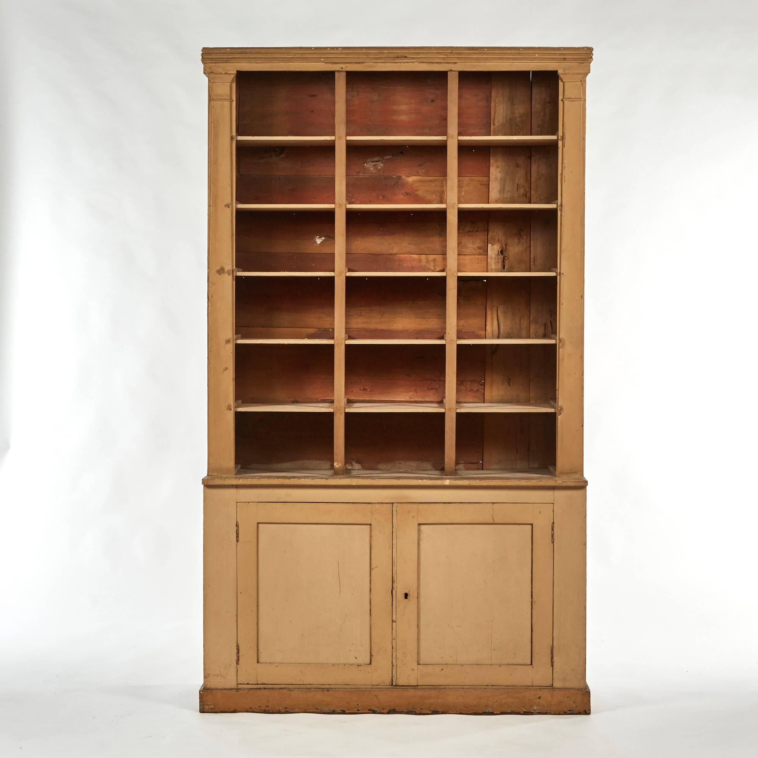 1790s French large painted Directoire era bookcase with lower cabinet.