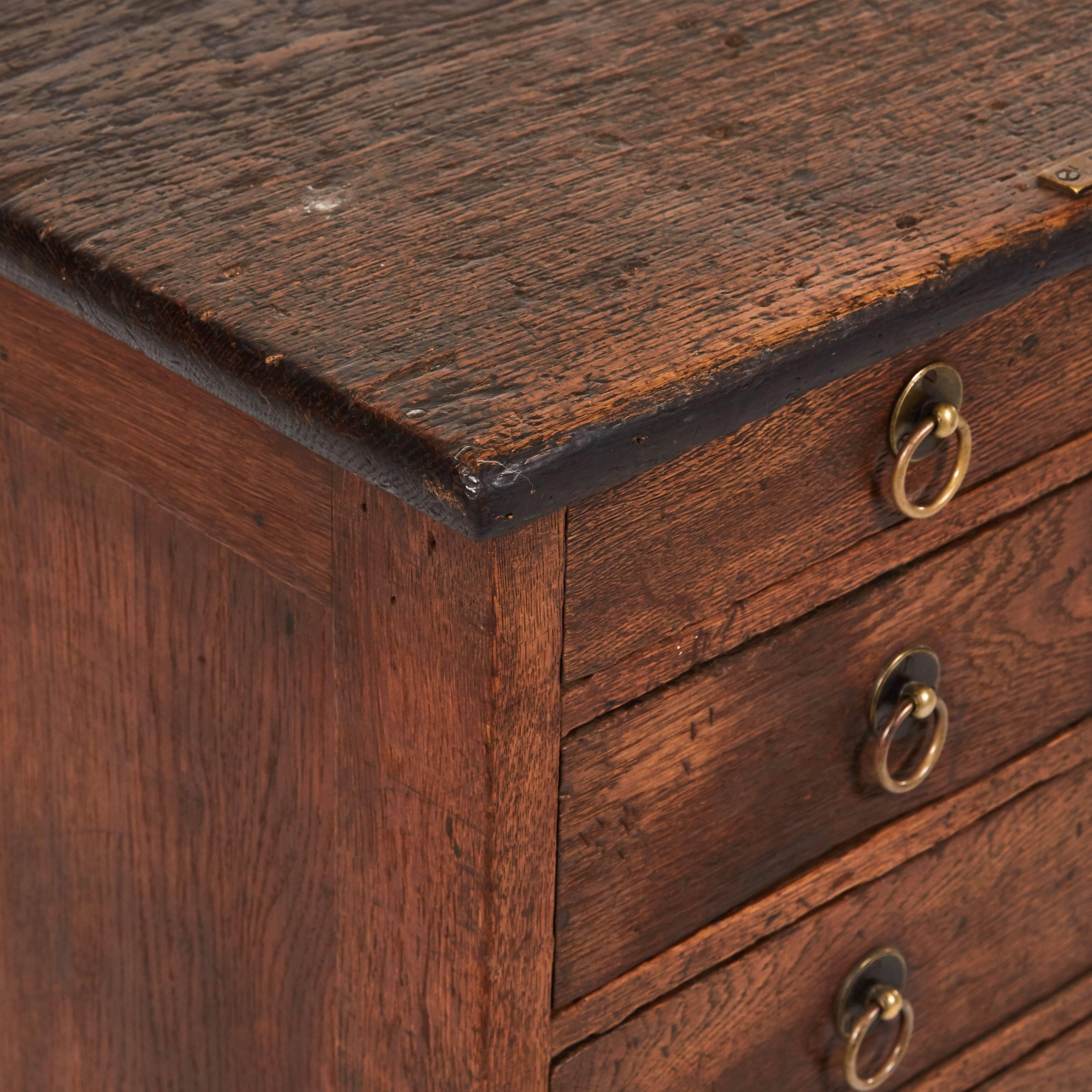 1880s French tailor's wood chest of drawers with brass handles and solid wood top. 