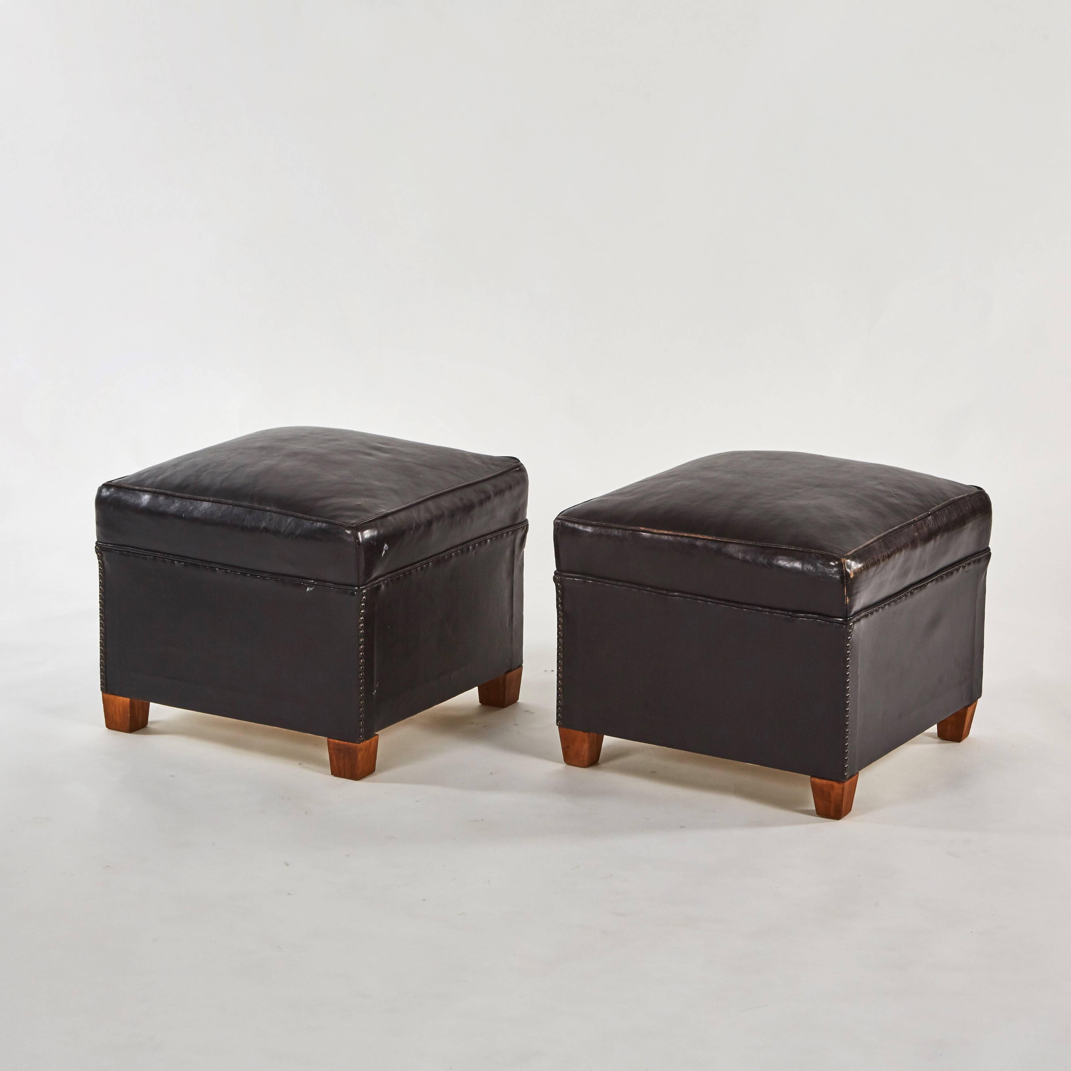 A set of four leather footstools in Art Deco style. (Can be sold individually for $1975).