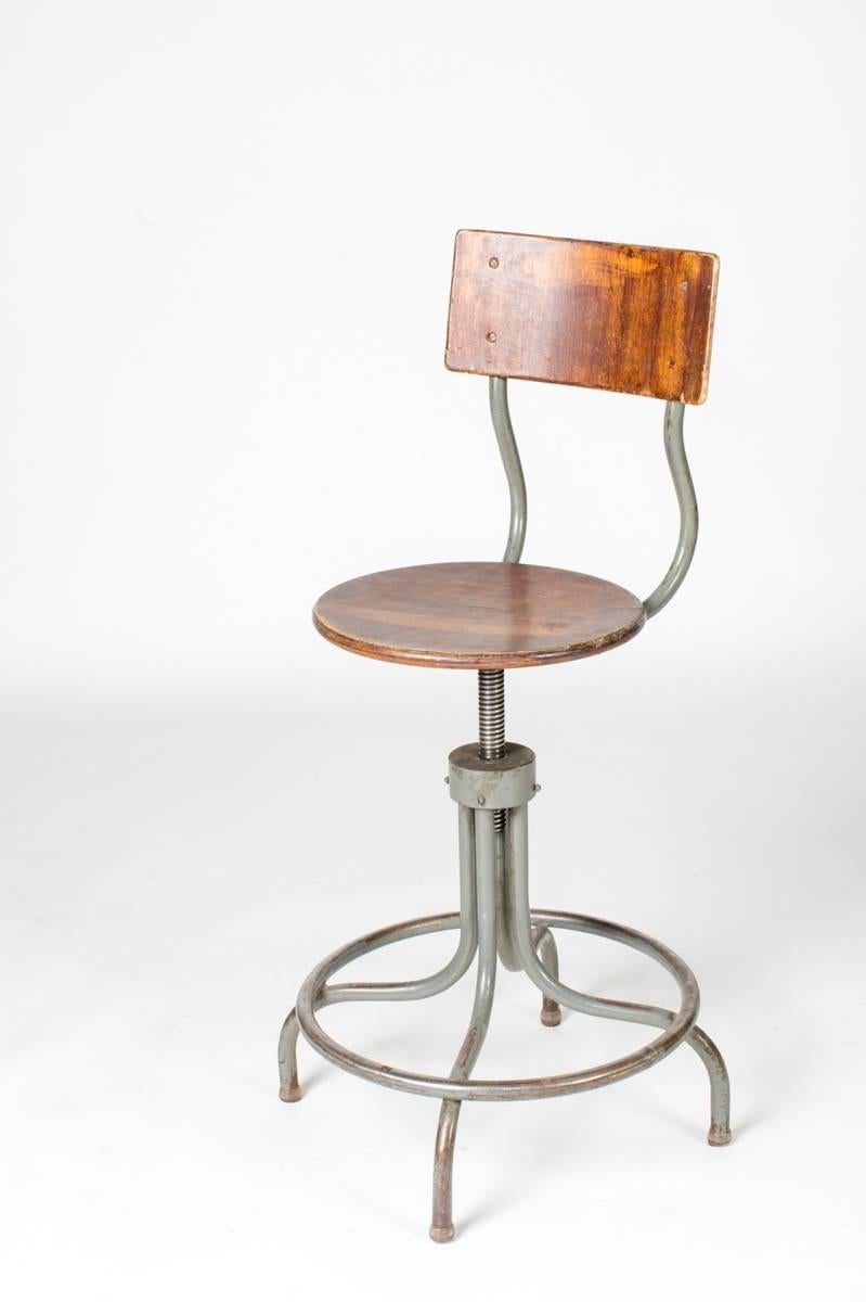 1940s, French Industrial wood and steel adjustable swivel stool.