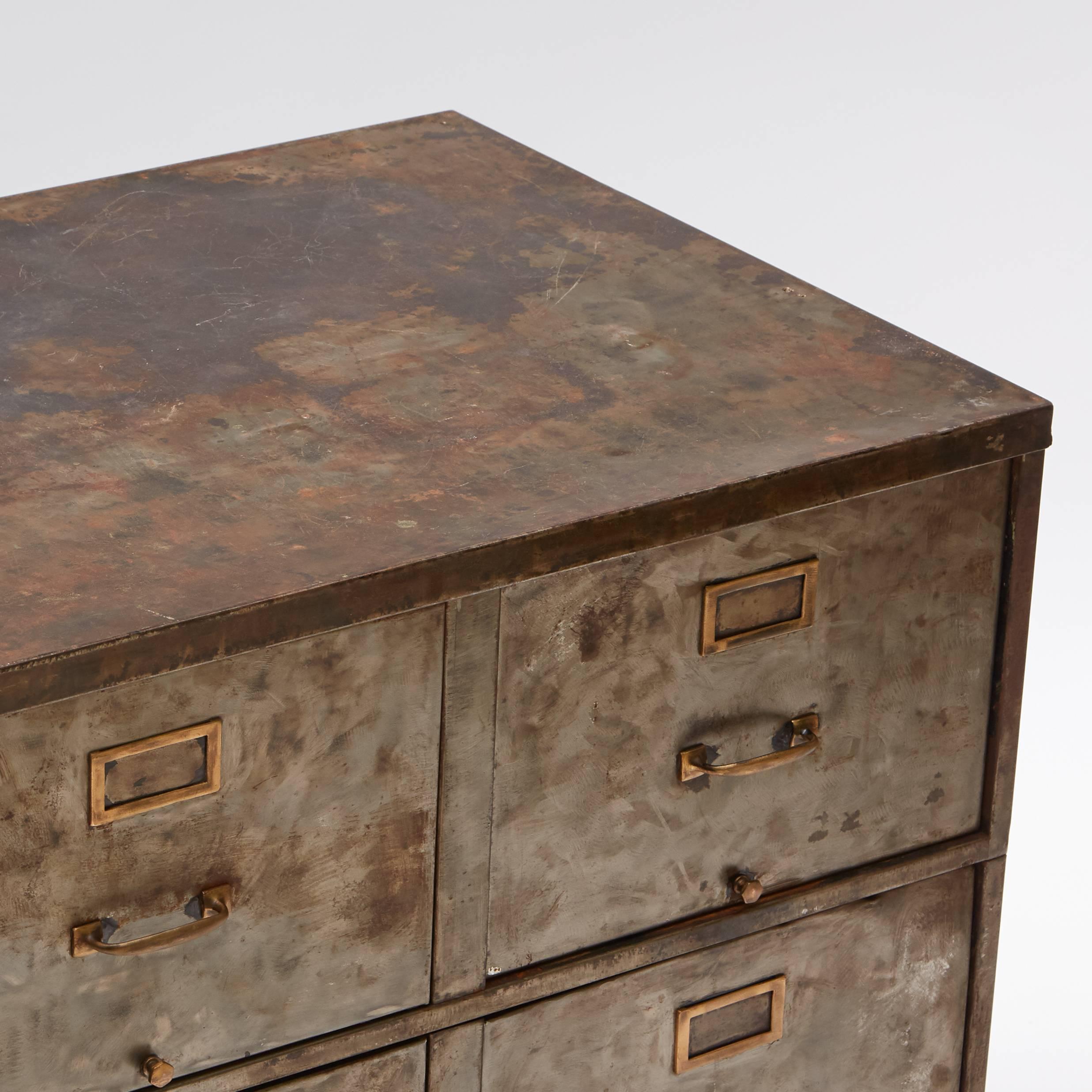 1930s metal filing cabinet with four drawers. 