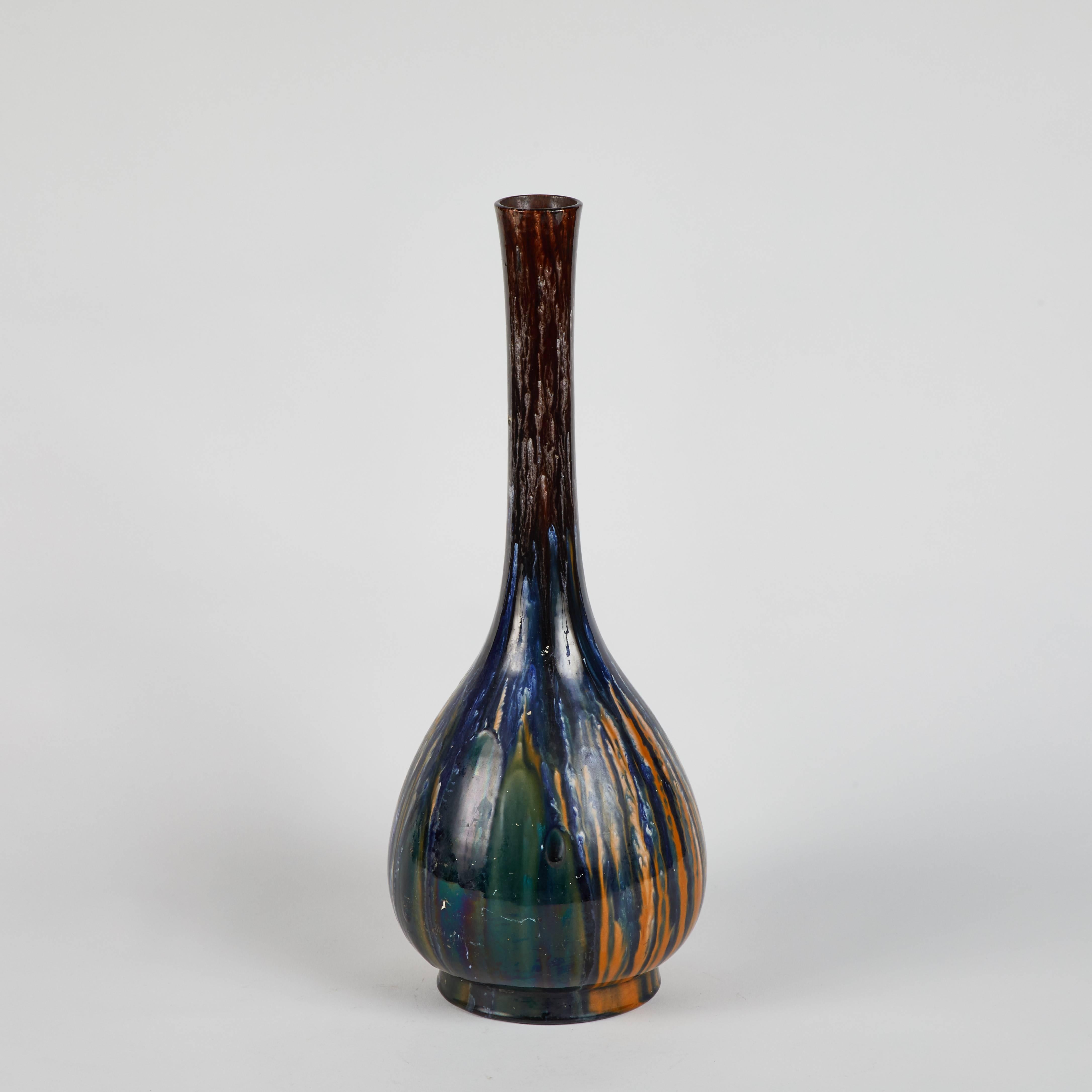 A glazed blue vase.