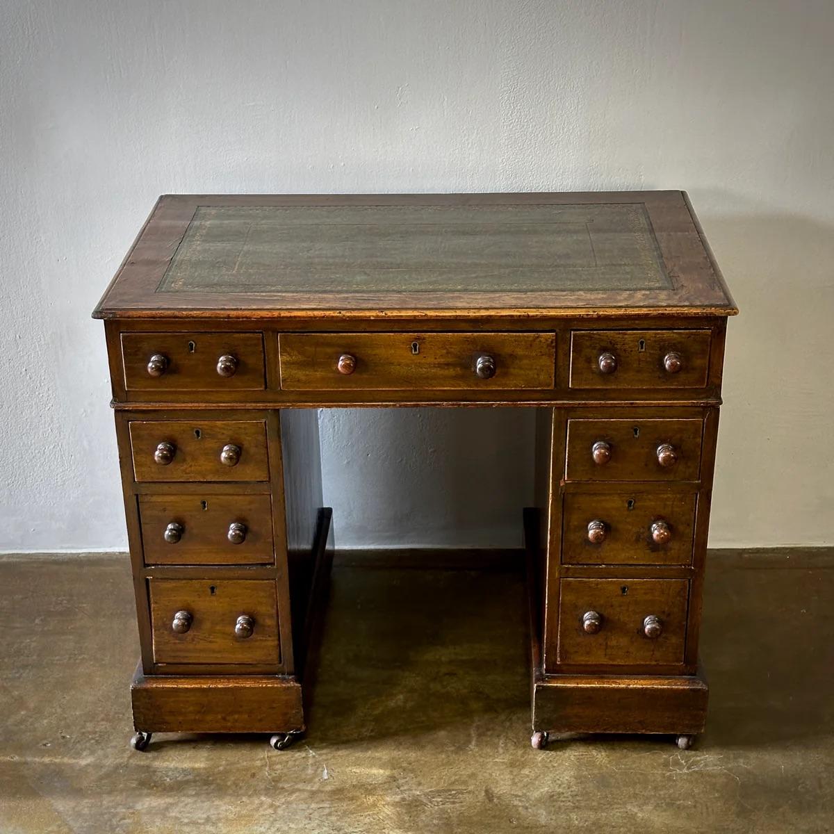 English Leather Topped Desk in Walnut For Sale