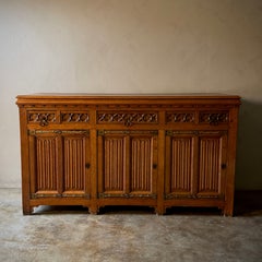 French Neo-Gothic Sideboard in Dark Oak, Carved Drawers, Circa 1830