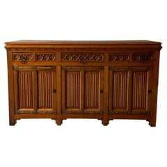 French Neo-Gothic Sideboard in Dark Oak, Carved Drawers, Circa 1830