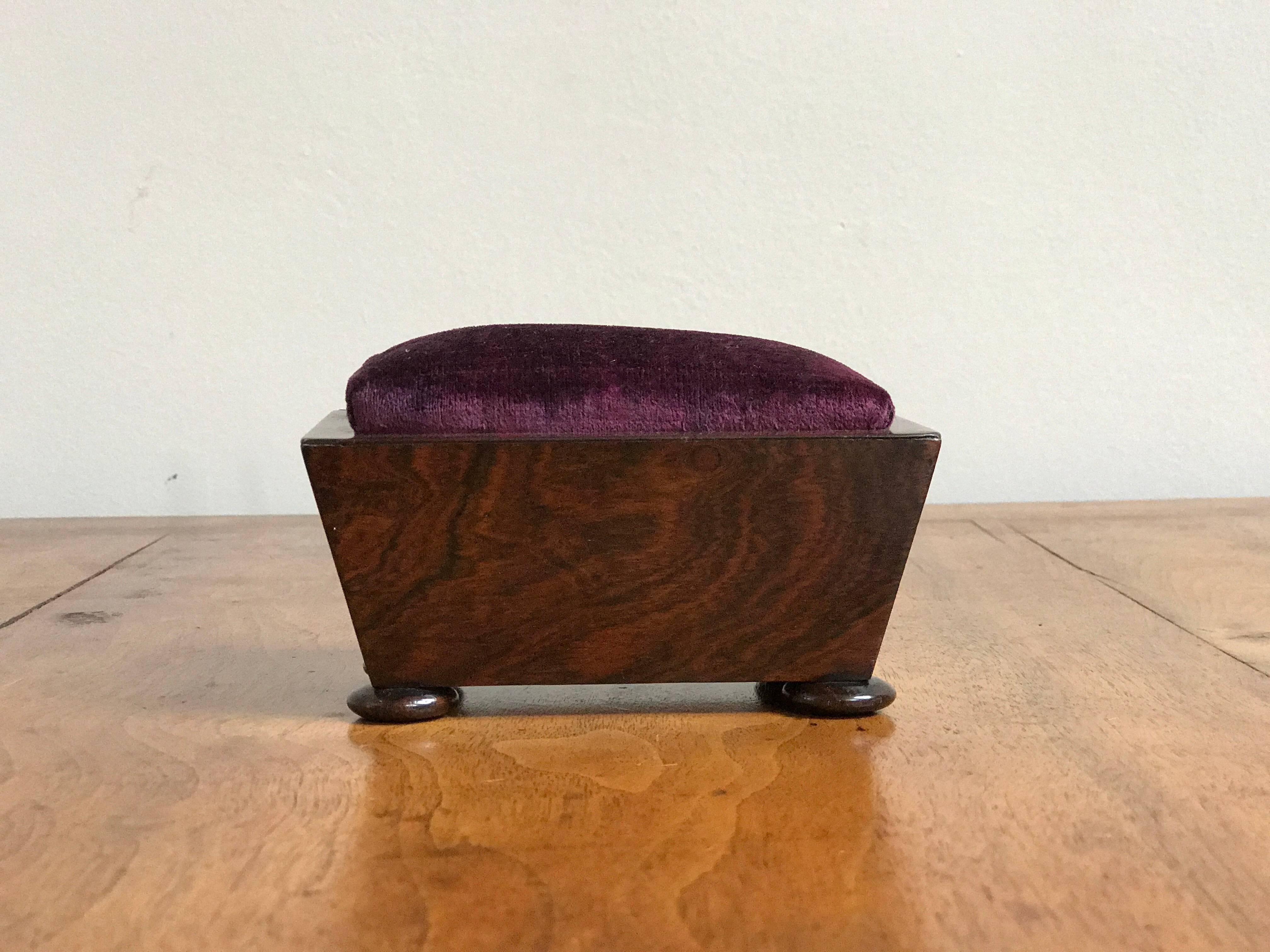 Wooden pin cushion box with round feet from late 19th century England. 