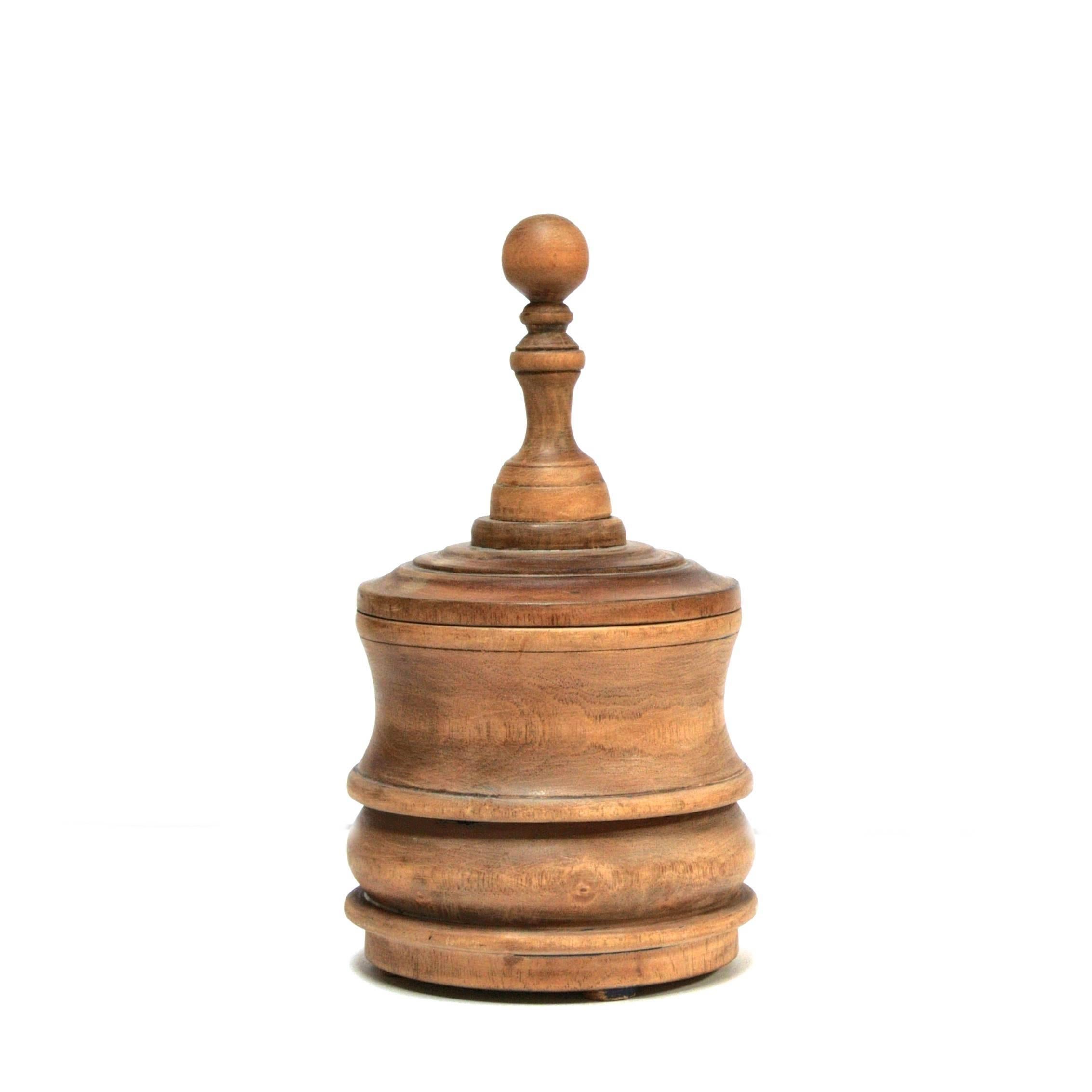 A wooden tobacco jar, Belgium, circa 1920.
