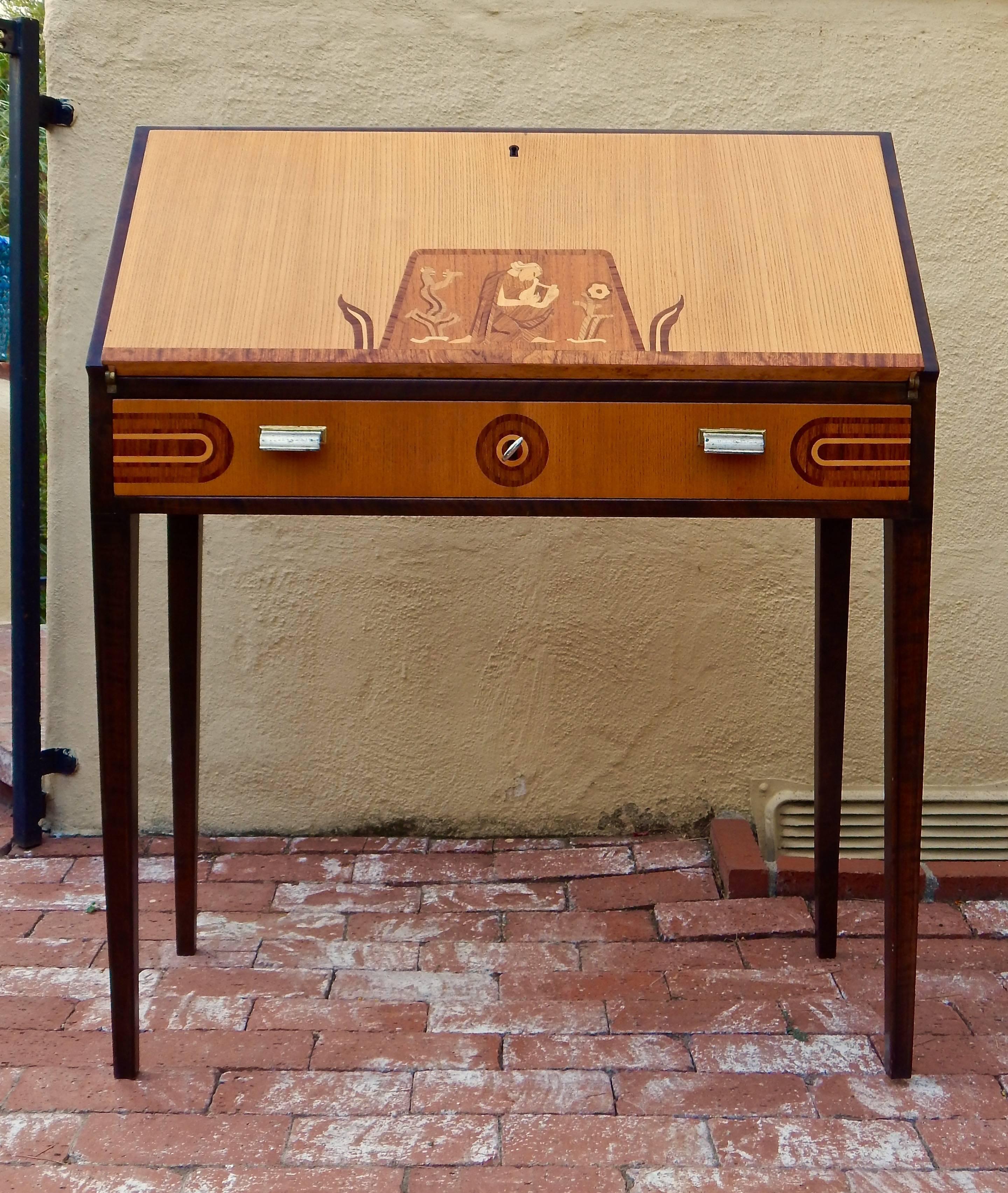 Swedish inlaid Art Deco or neoclassical drop front secretaire or desk. Made at Ferdinand Lundquist in Gothenburg, Sweden, circa 1920. Exterior case in elm an birch. Inlay woods include rosewood, mahogany and maple. Interior in flame birch and