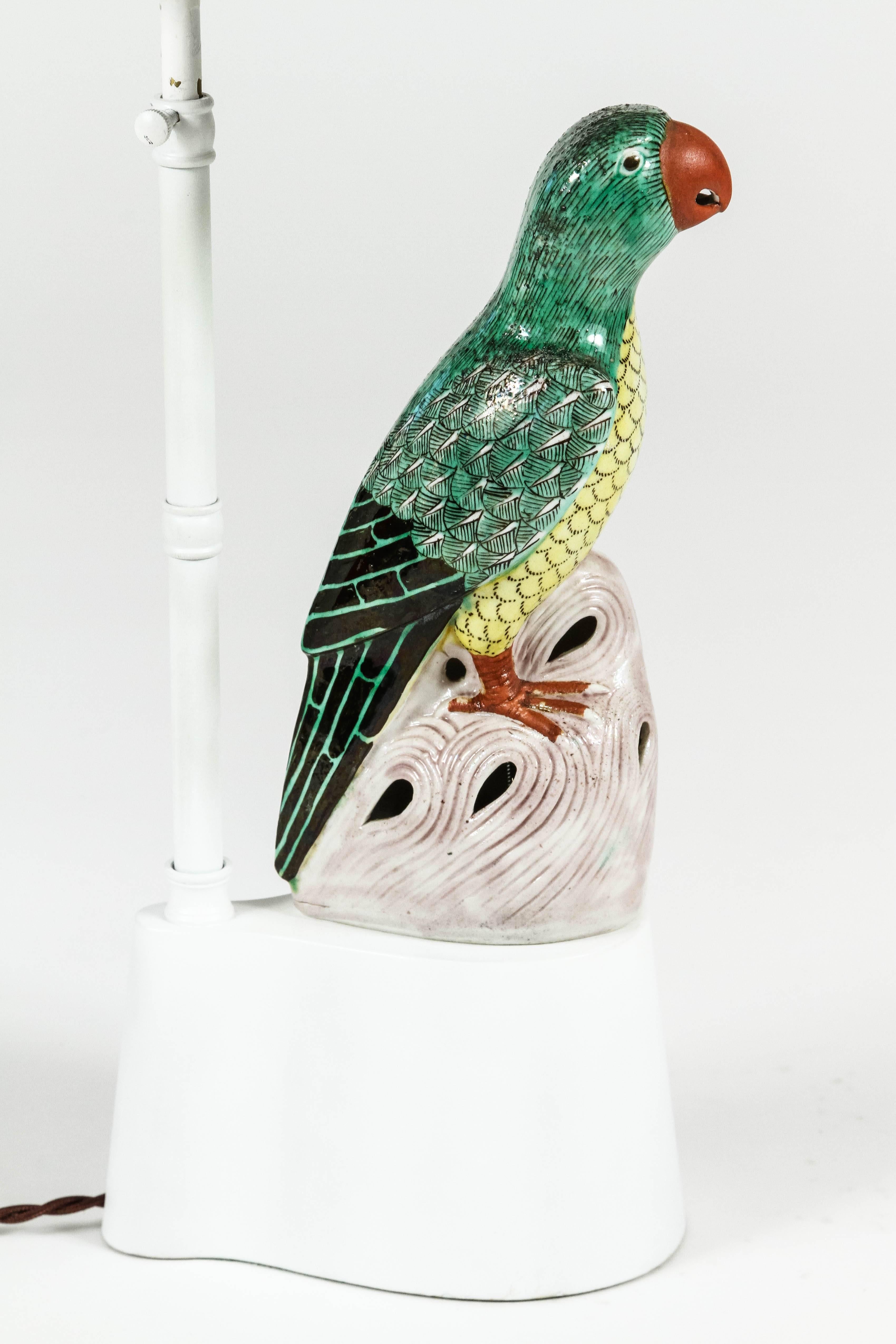 Charming armature lamp by William Haines featuring a ceramic parrot and custom Maria Kipp shade. Lamp has been rewired with cloth twist cord. This lamp was acquired from the estate of renowned LA florist David Jones.

Dimensions in listing are